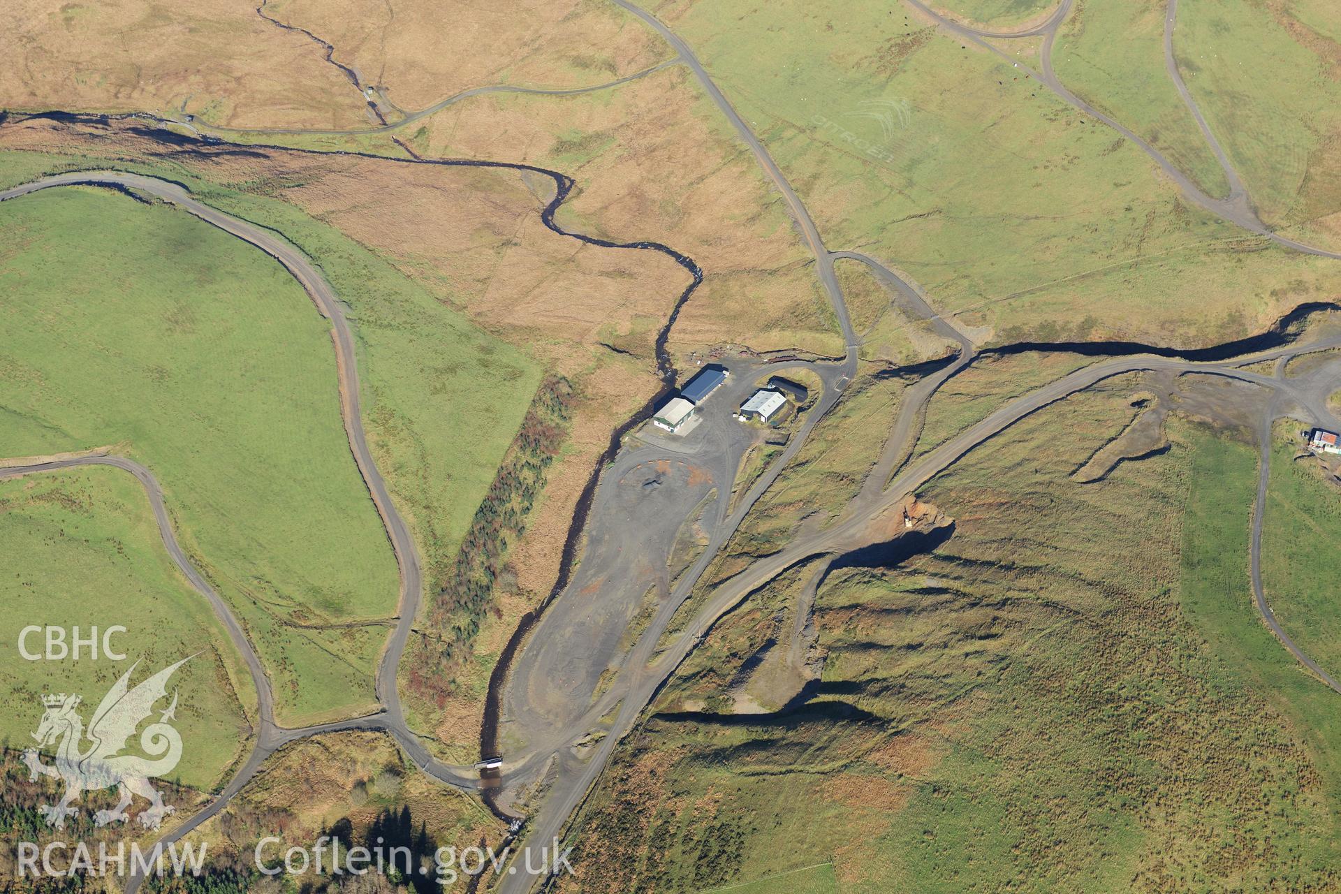RCAHMW colour oblique photograph of Wye Valley Lead Mine, disused, with modern buildings and trackways. Taken by Toby Driver on 05/11/2012.