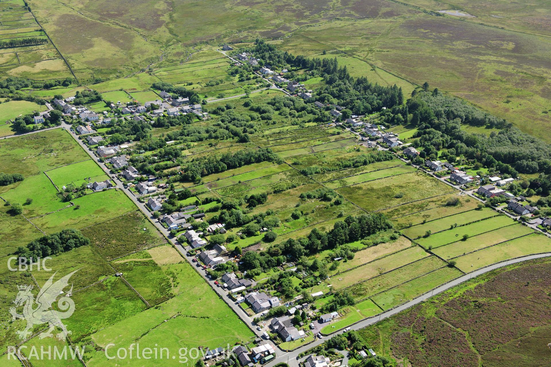 RCAHMW colour oblique photograph of industrial housing, Tan-y-Bwlch, viewed from the north-west. Taken by Toby Driver on 10/08/2012.