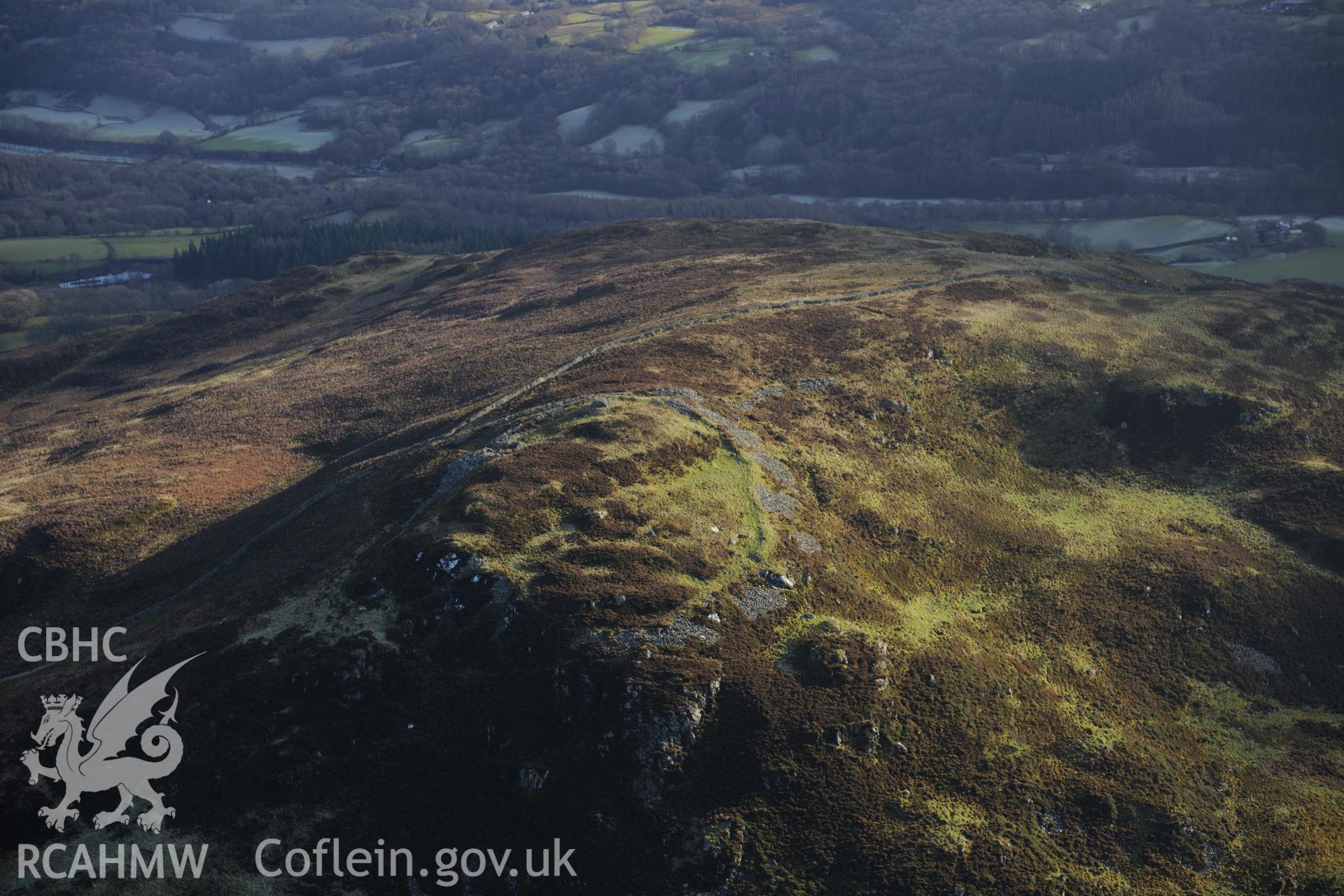 RCAHMW colour oblique photograph of Moel Offrwm, hillfort. Taken by Toby Driver on 10/12/2012.