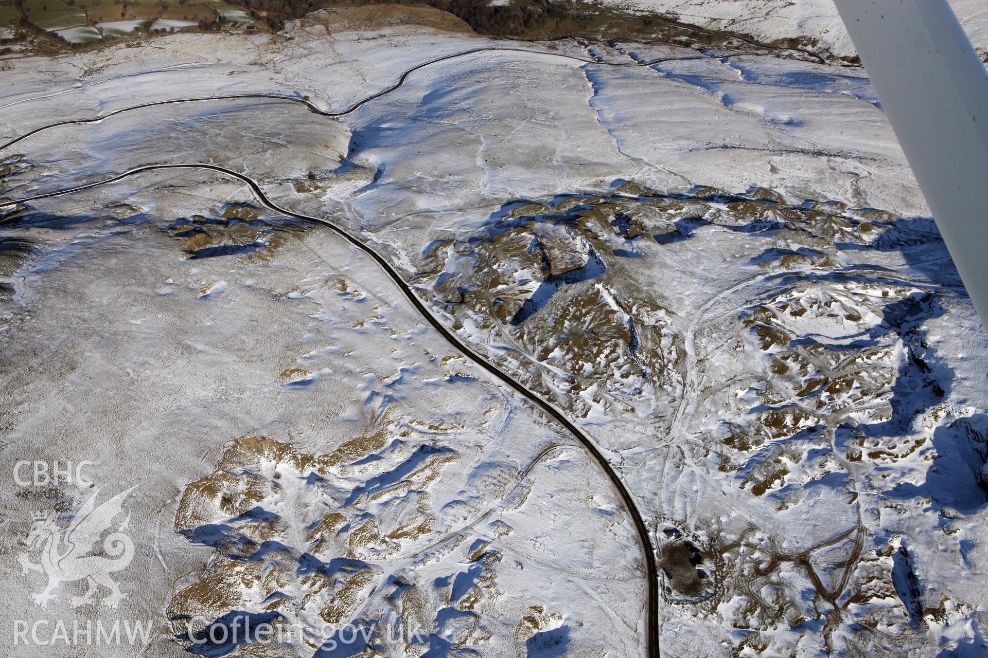 RCAHMW colour oblique photograph of Long view of Foel Fawr Quarry Complex. Taken by Toby Driver on 02/02/2012.