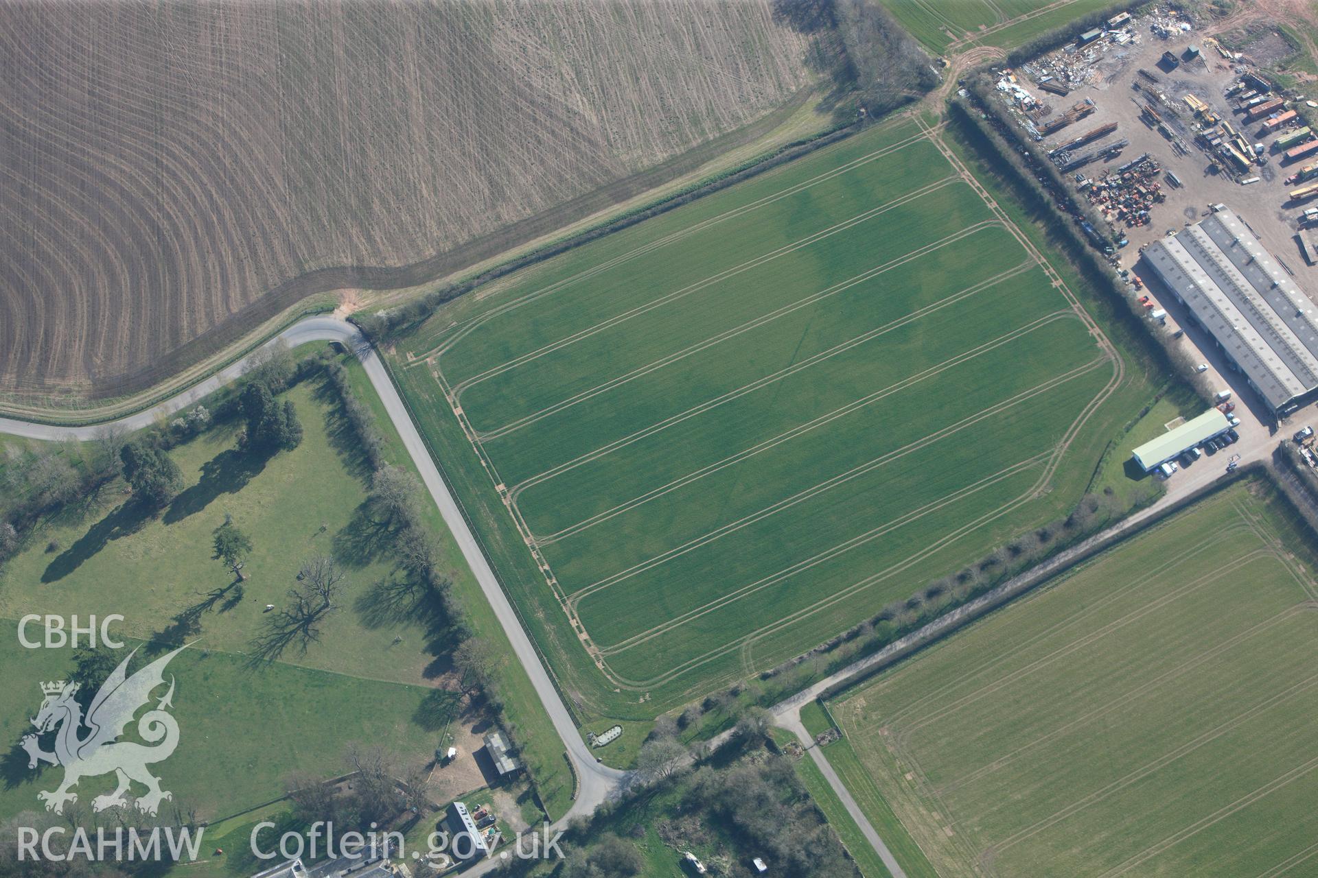 RCAHMW colour oblique photograph of Llancayo Farm barrow cemetery, southern cluster. Taken by Toby Driver and Oliver Davies on 28/03/2012.