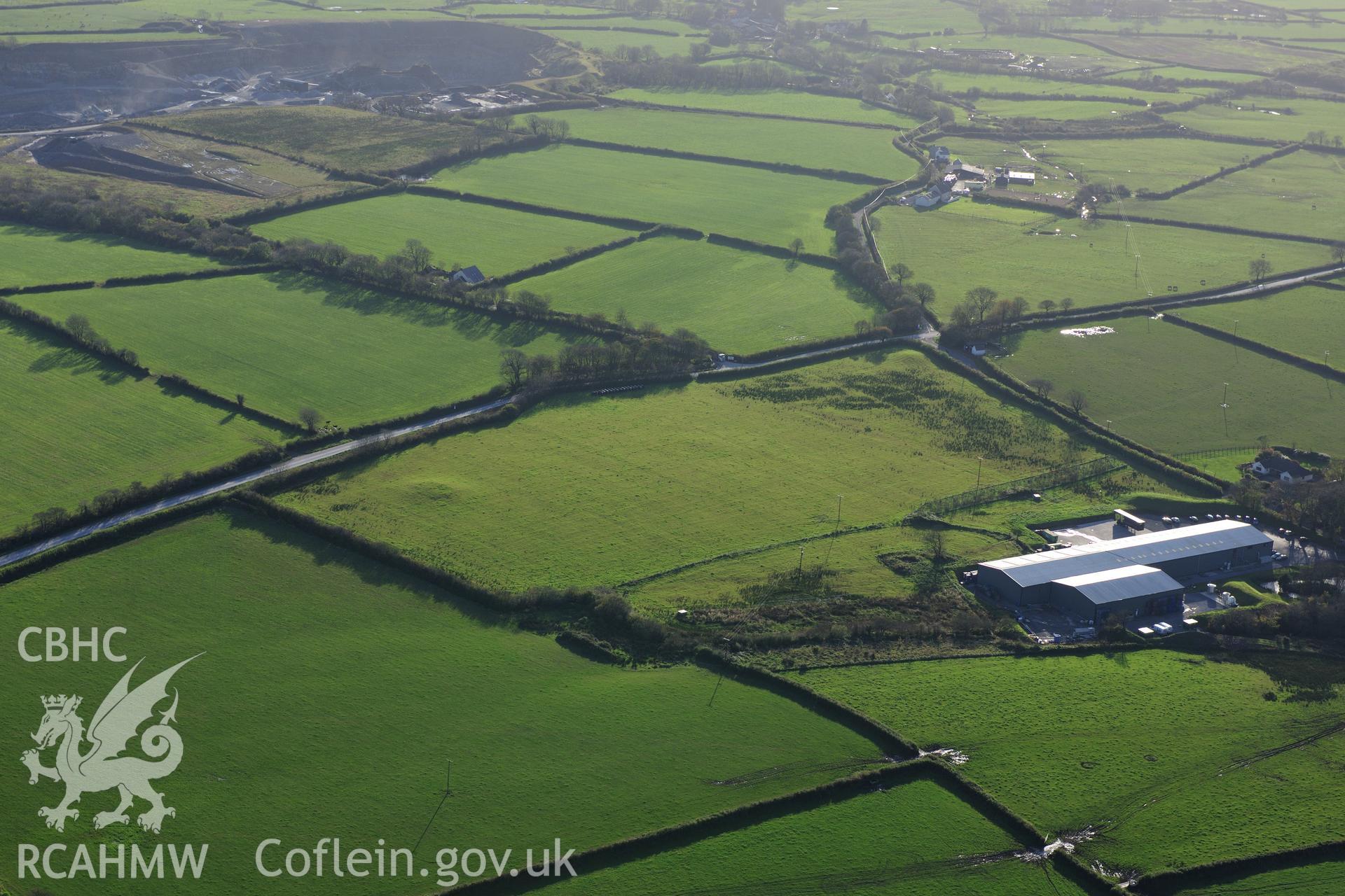 RCAHMW colour oblique photograph of New House Round Barrows. Taken by Toby Driver on 26/10/2012.