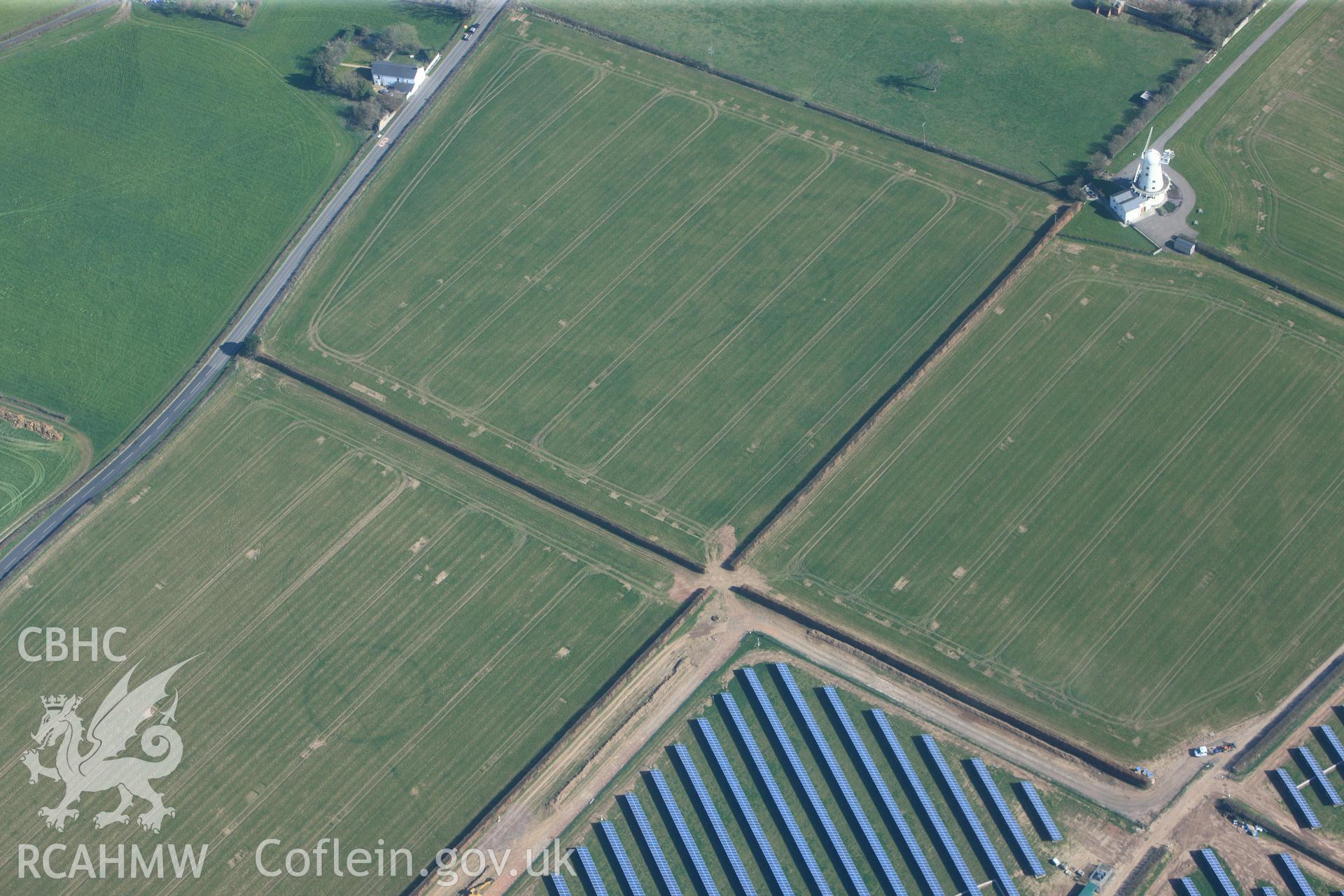 RCAHMW colour oblique photograph of Llancayo Farm Roman marching camp and barrow cemetery. Taken by Toby Driver and Oliver Davies on 28/03/2012.