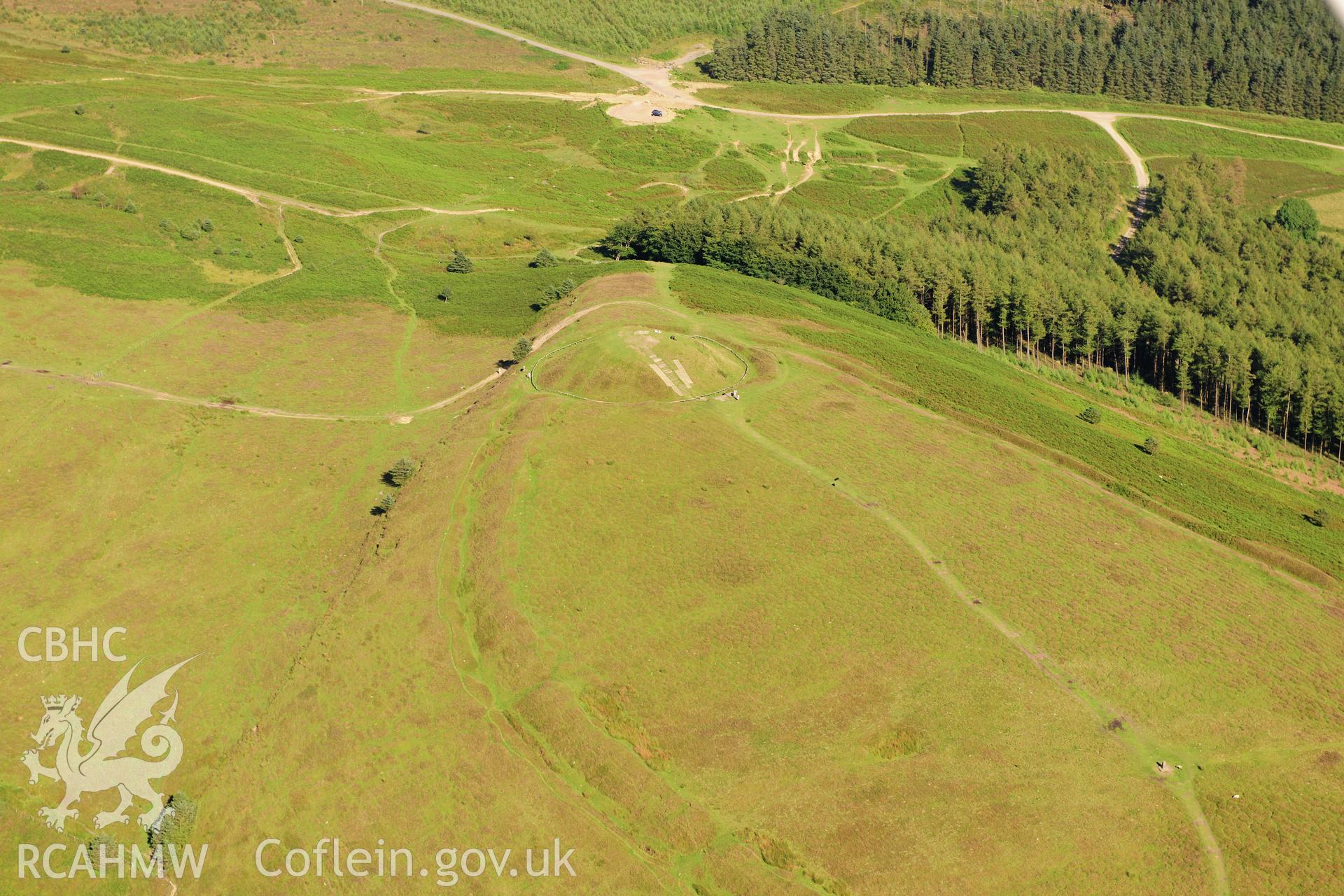 RCAHMW colour oblique photograph of Twmbarlwm, Castle and hillfort. Taken by Toby Driver on 24/07/2012.