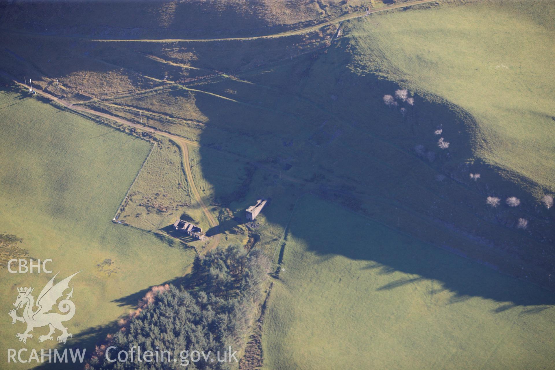 RCAHMW colour oblique photograph of Castell Mine, isolated wheel pit to east. Taken by Toby Driver on 05/11/2012.