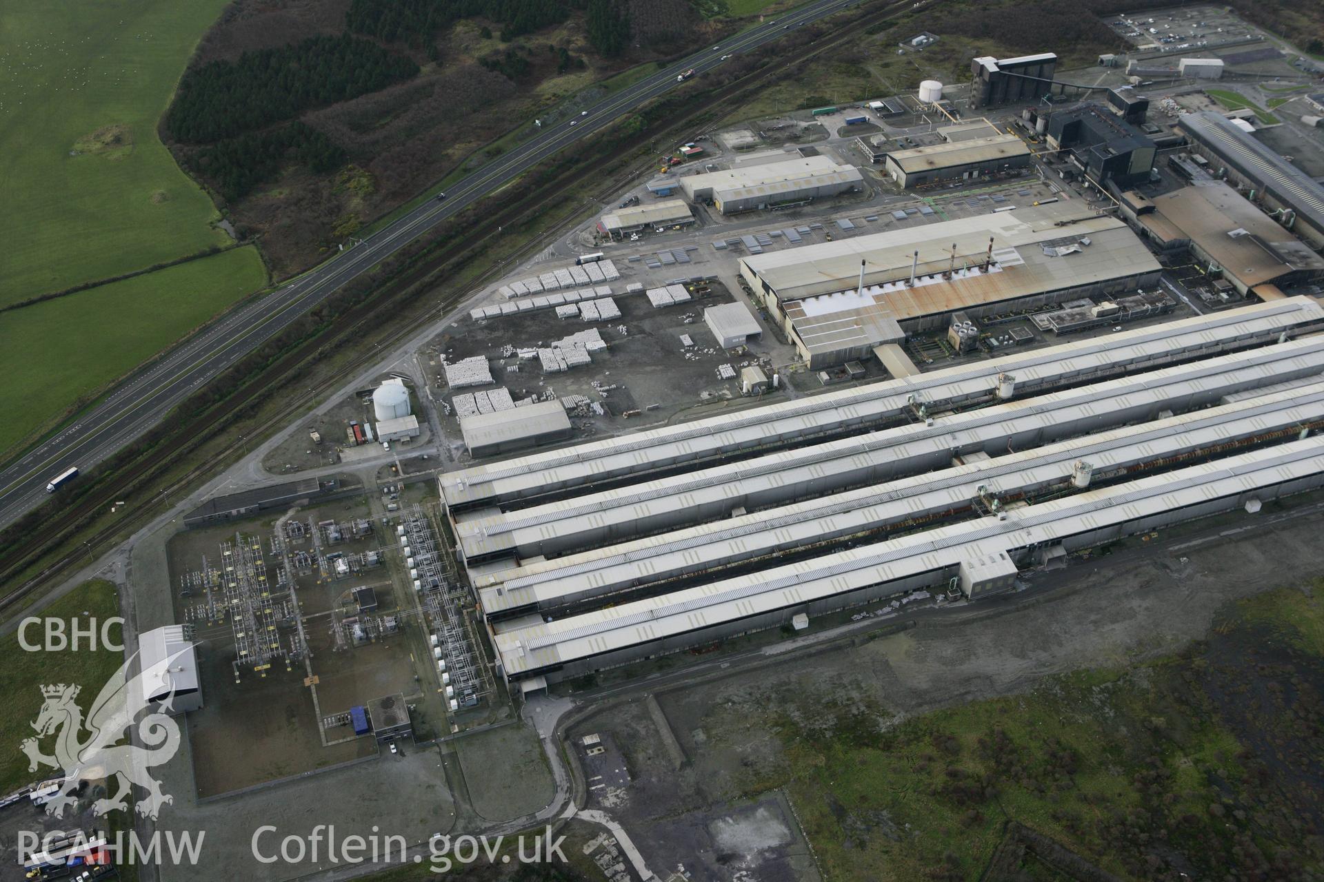 RCAHMW colour oblique photograph of Anglesey Aluminium Smelting Works, aerial survey prior to closure. Taken by Toby Driver on 13/01/2012.