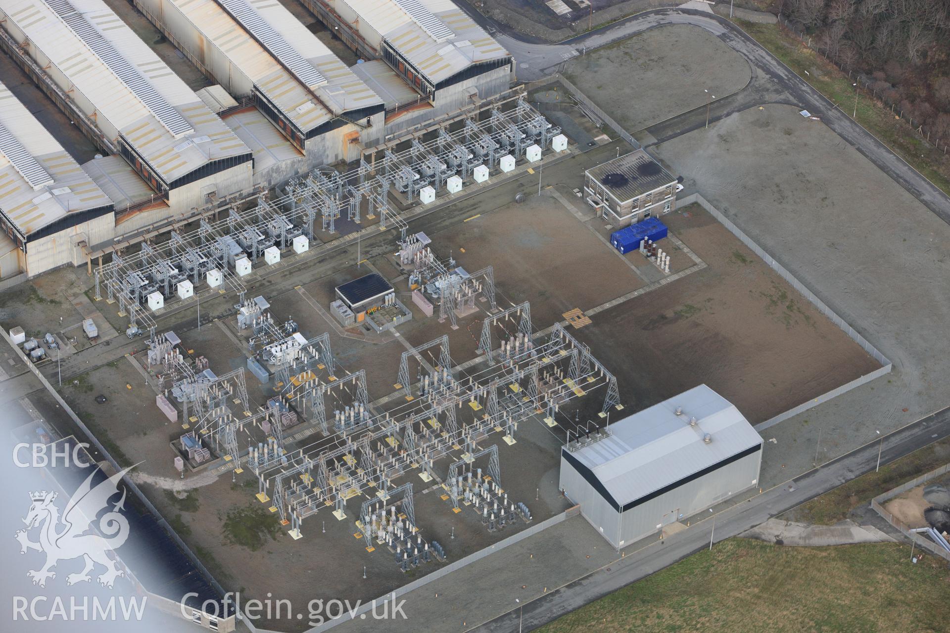 RCAHMW colour oblique photograph of Anglesey Aluminium Smelting Works, aerial survey prior to closure. Taken by Toby Driver on 13/01/2012.