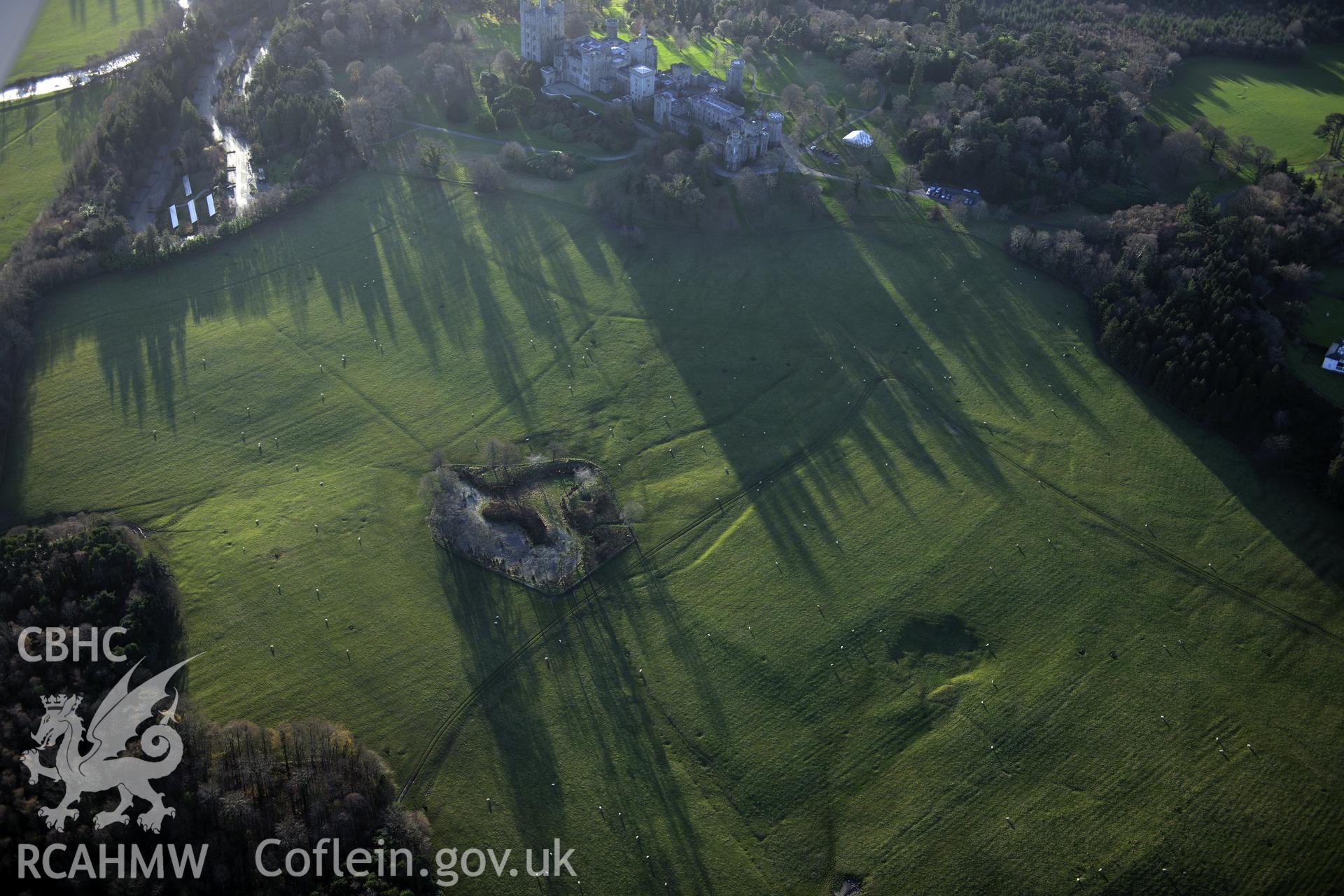 RCAHMW colour oblique photograph of Penrhyn Park earthworks, earthworks in north-east part of parkland. Taken by Toby Driver on 10/12/2012.