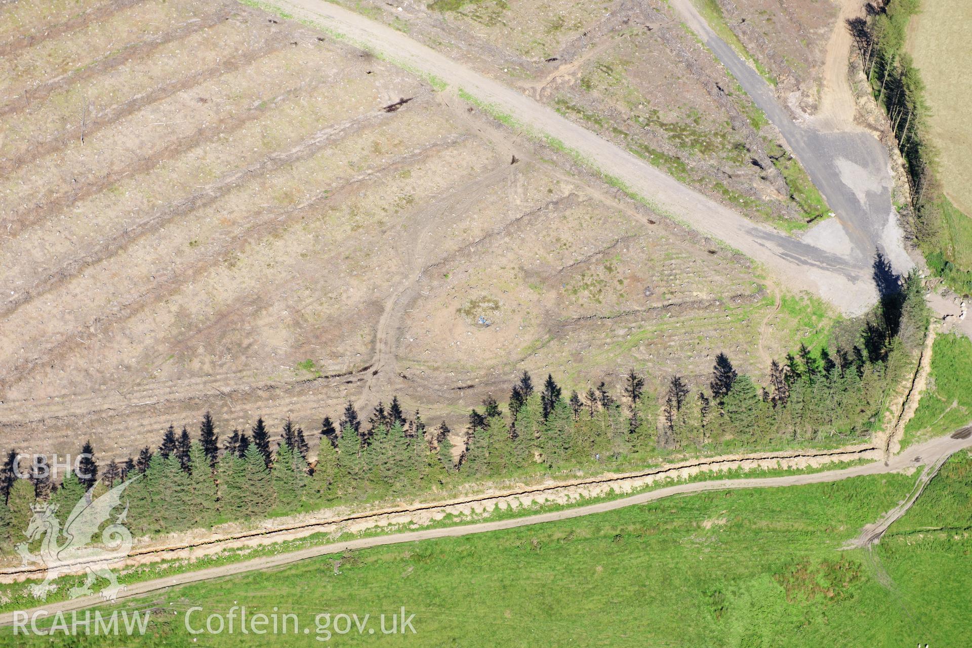 RCAHMW colour oblique photograph of The Bryn, round barrows. Taken by Toby Driver on 24/07/2012.