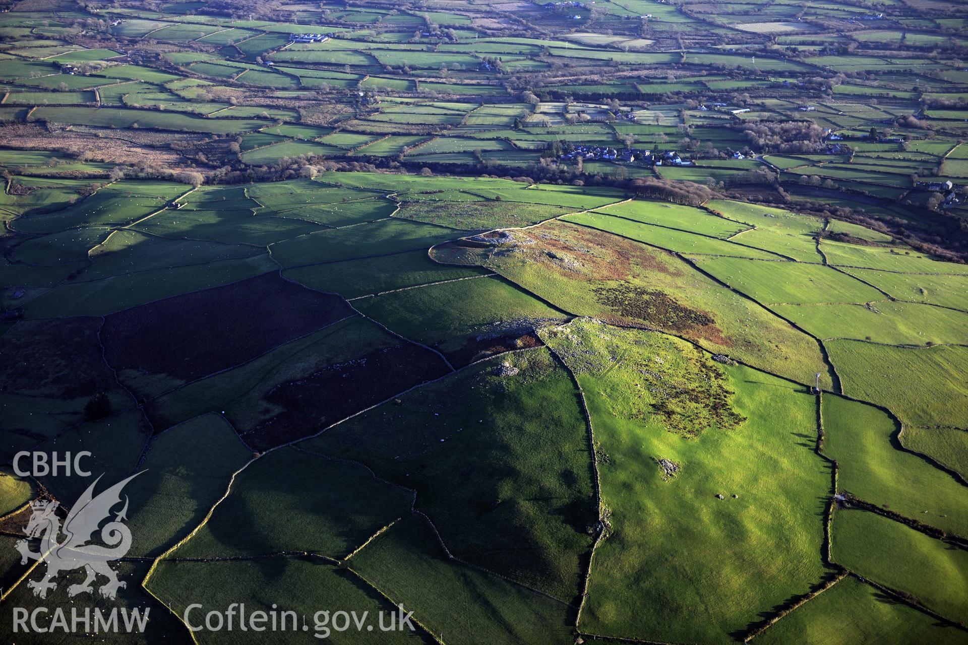 RCAHMW colour oblique photograph of Carn Pentyrch Hillfort. Taken by Toby Driver on 10/12/2012.