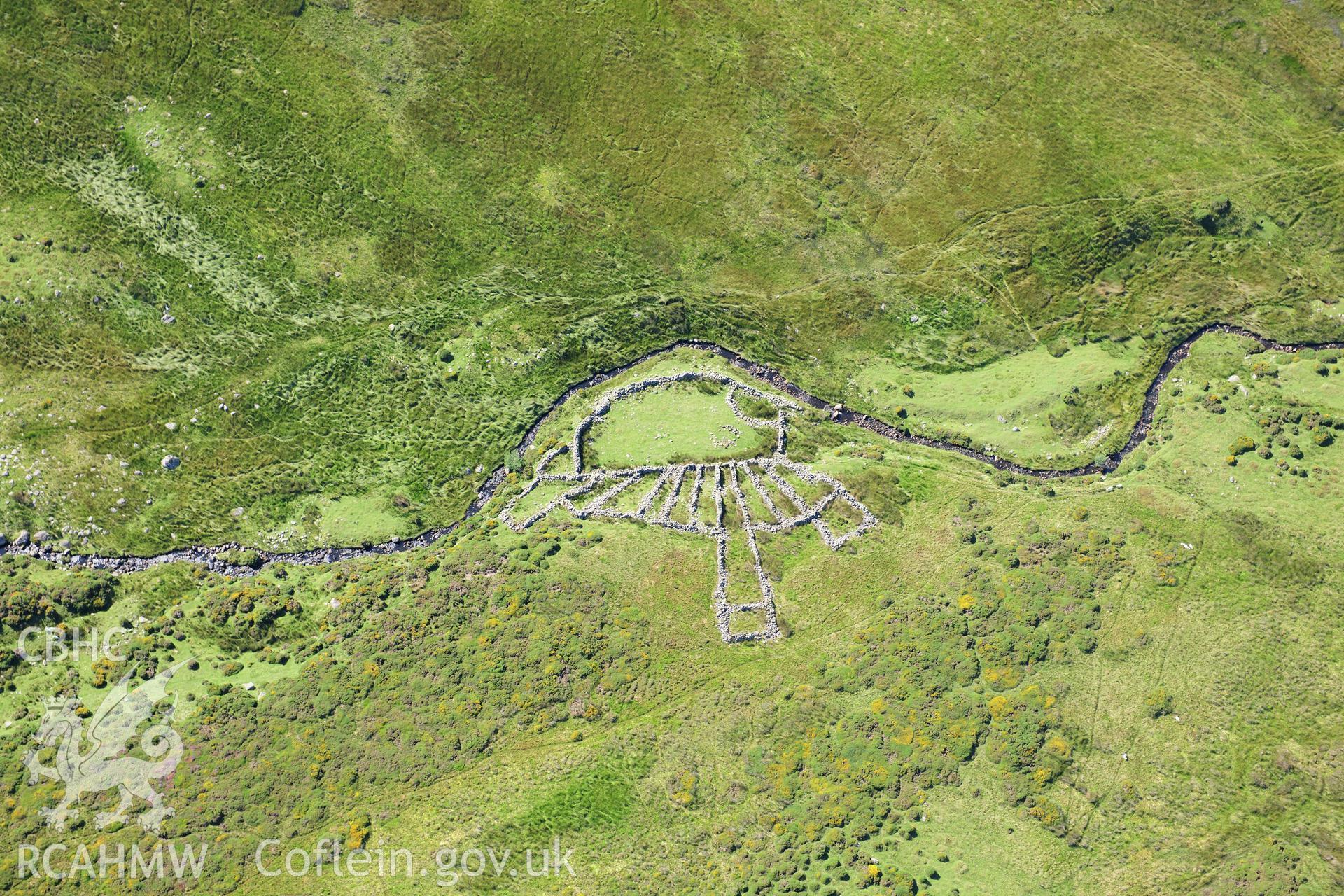 RCAHMW colour oblique photograph of sheepfold, Maen Crwn, viewed from the east. Taken by Toby Driver on 10/08/2012.