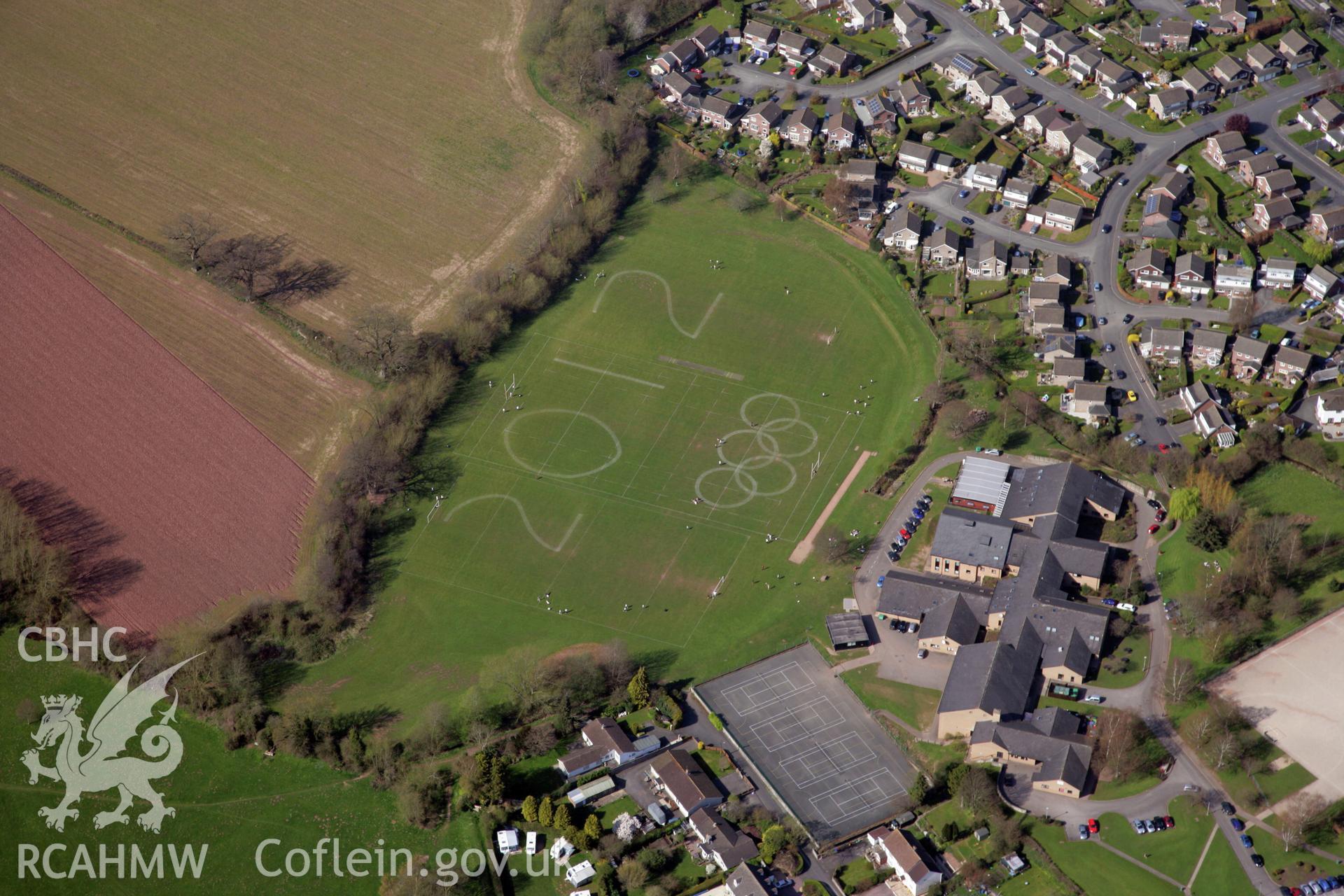 RCAHMW colour oblique photograph of Crickhowell High School, '2012' Olympic art in playing field. Taken by Toby Driver and Oliver Davies on 28/03/2012.