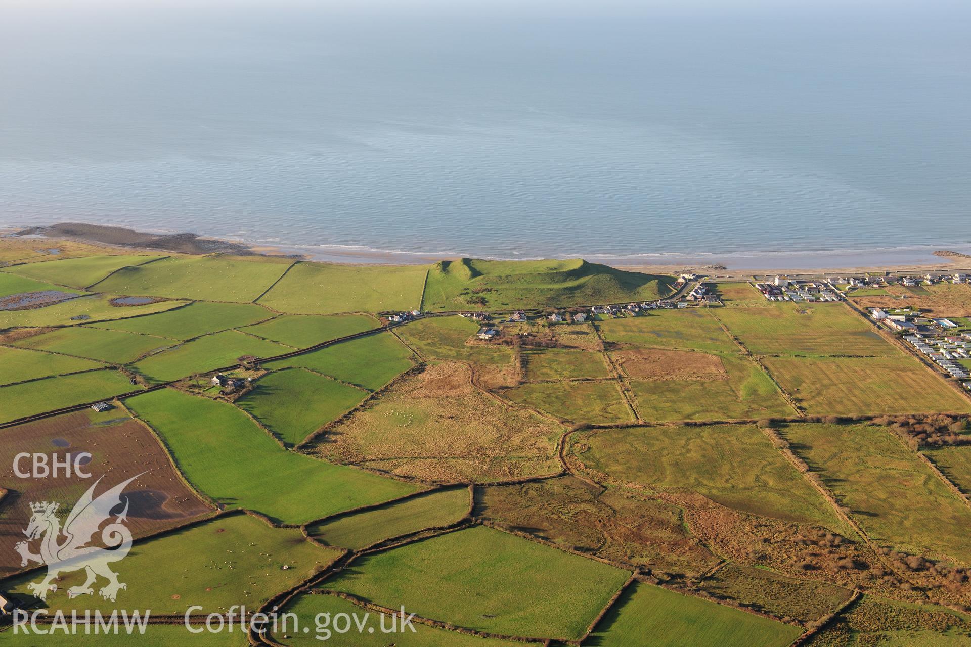 RCAHMW colour oblique photograph of Dinas Dinlle hillfort. Taken by Toby Driver on 10/12/2012.