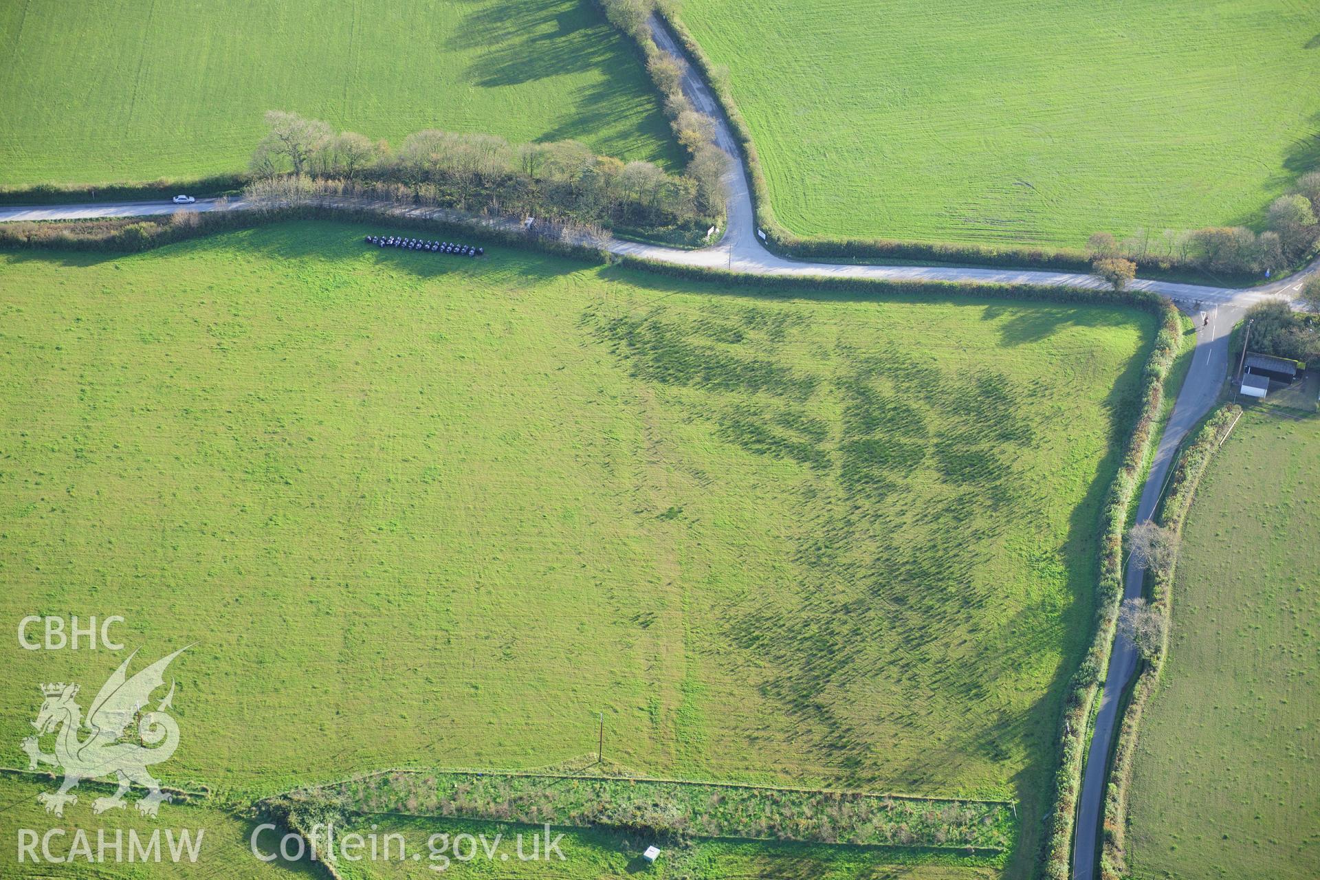 RCAHMW colour oblique photograph of New House Round Barrows. Taken by Toby Driver on 26/10/2012.