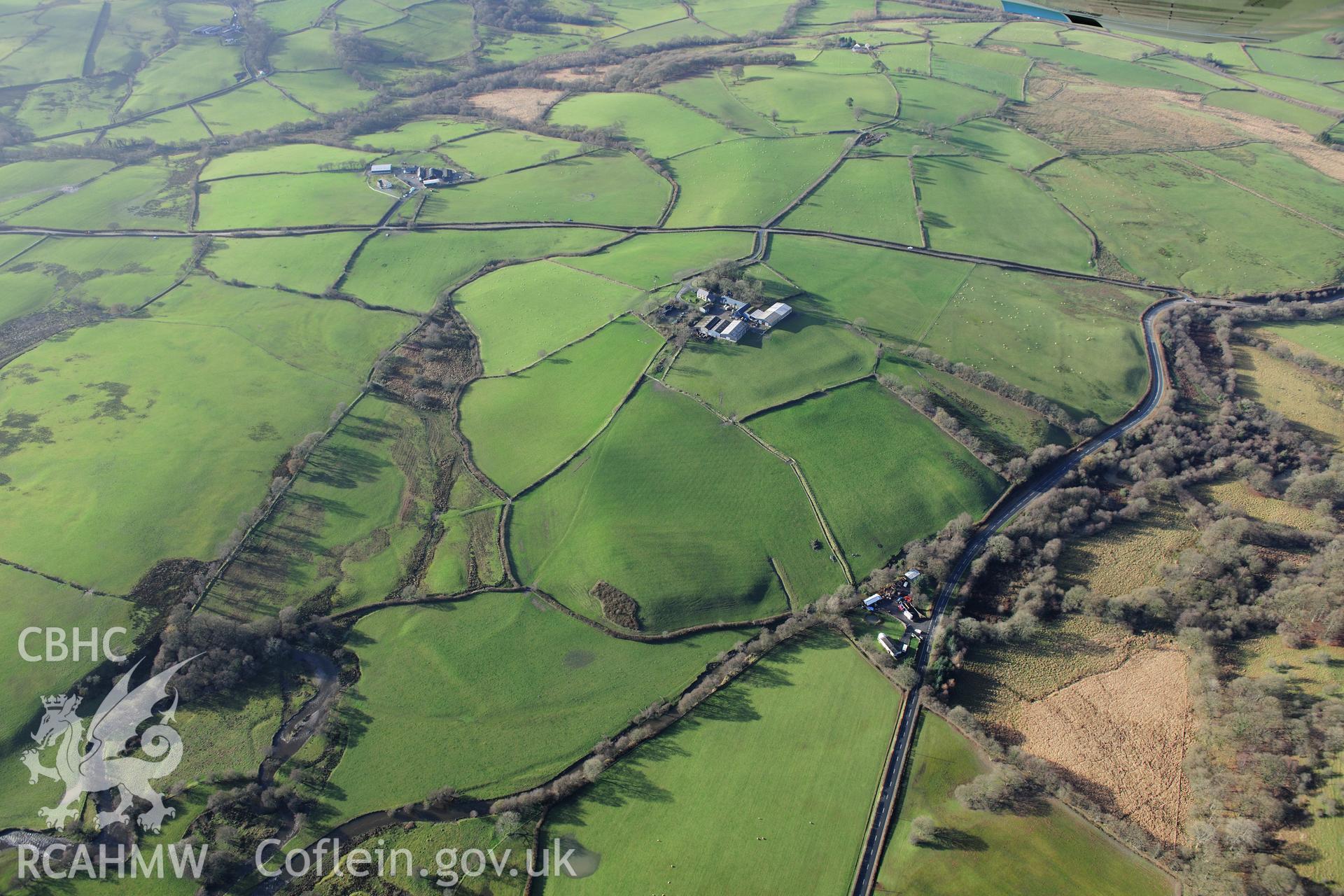 RCAHMW colour oblique photograph of Caerau Roman fort, showing riverside earthworks to south-east. Taken by Toby Driver on 23/11/2012.