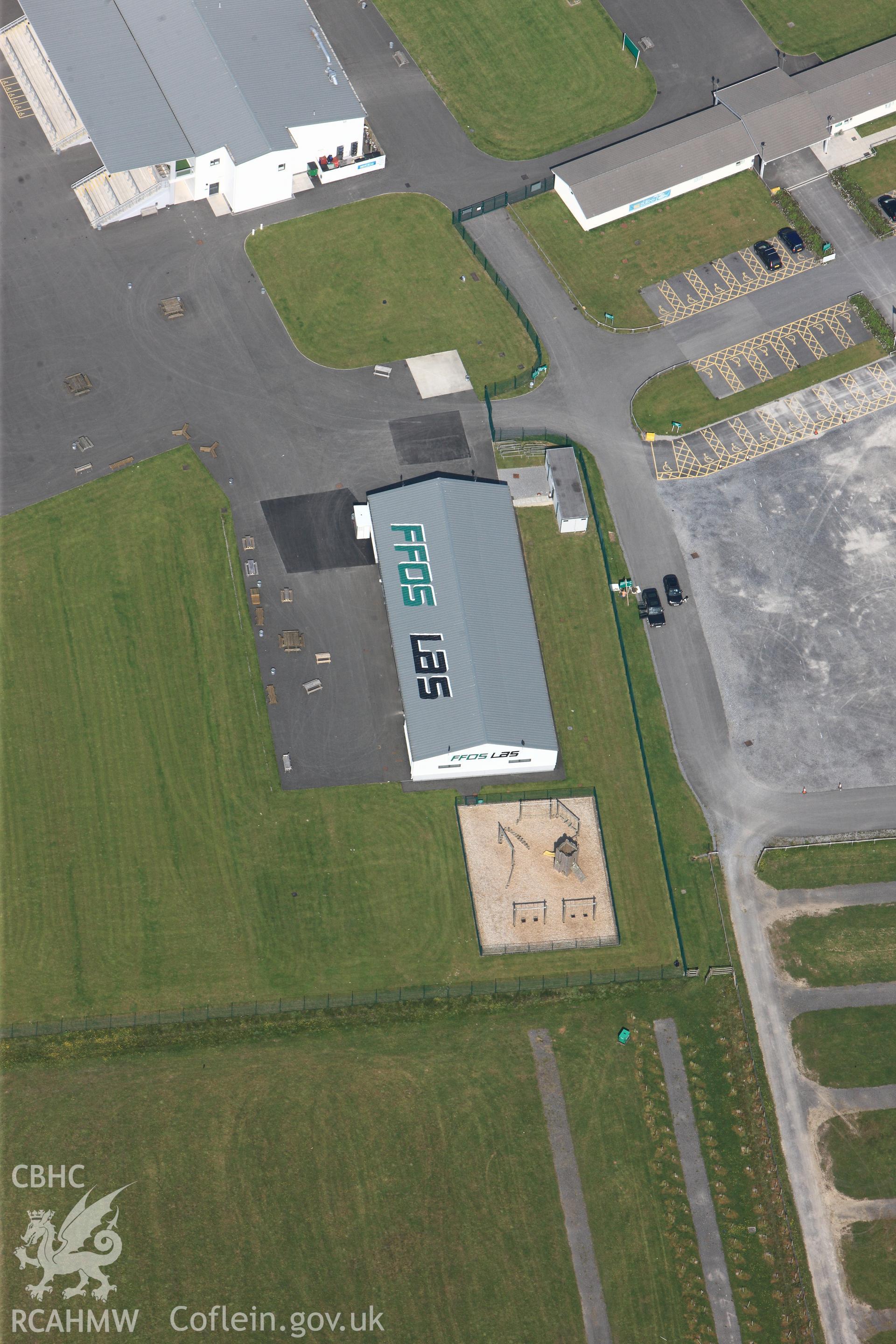 RCAHMW colour oblique photograph of Close view of buildings at Ffos Las racecourse, looking north. Taken by Toby Driver on 24/05/2012.