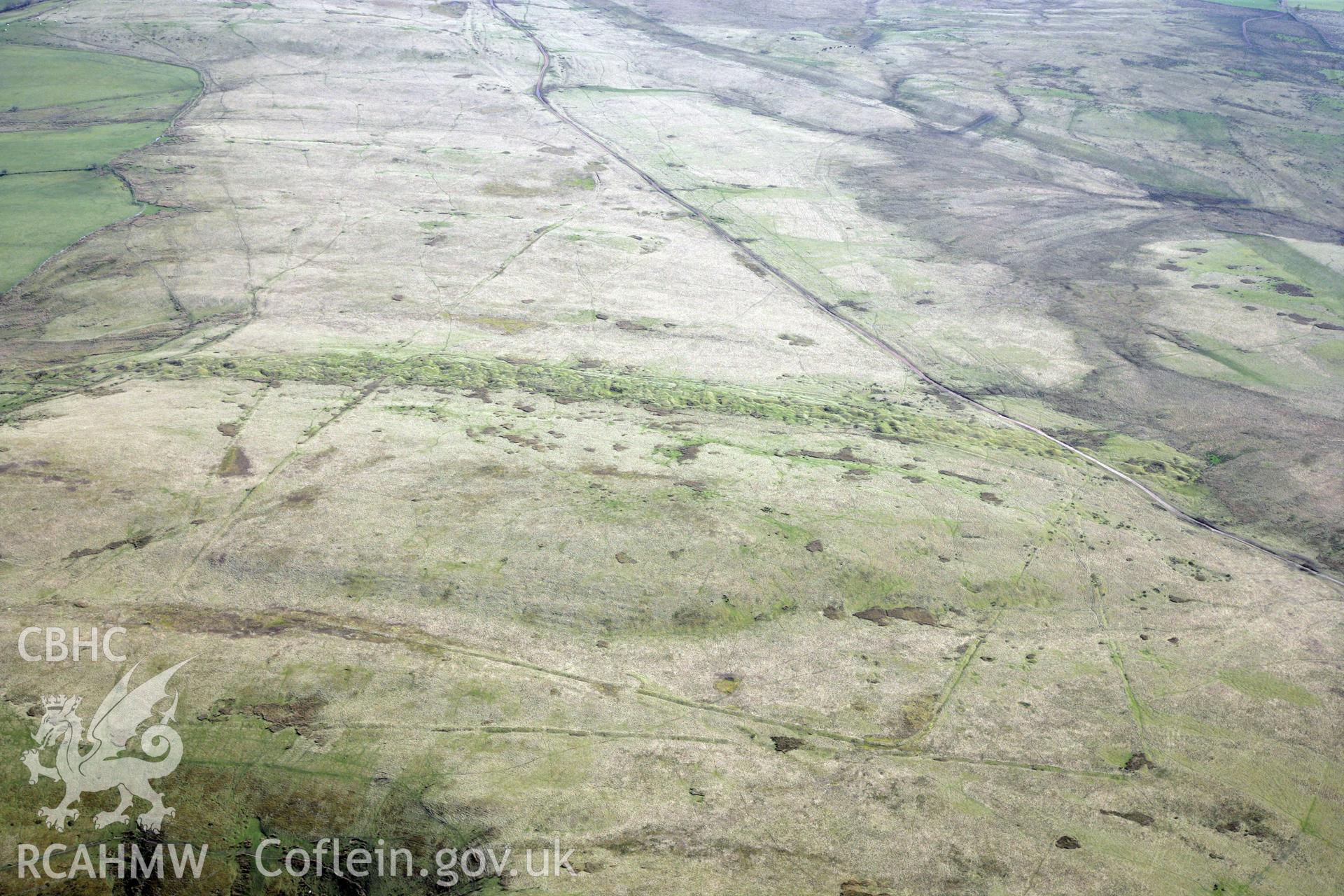 RCAHMW colour oblique photograph of Y Pigwn Roman marching camps. Taken by Toby Driver and Oliver Davies on 28/03/2012.