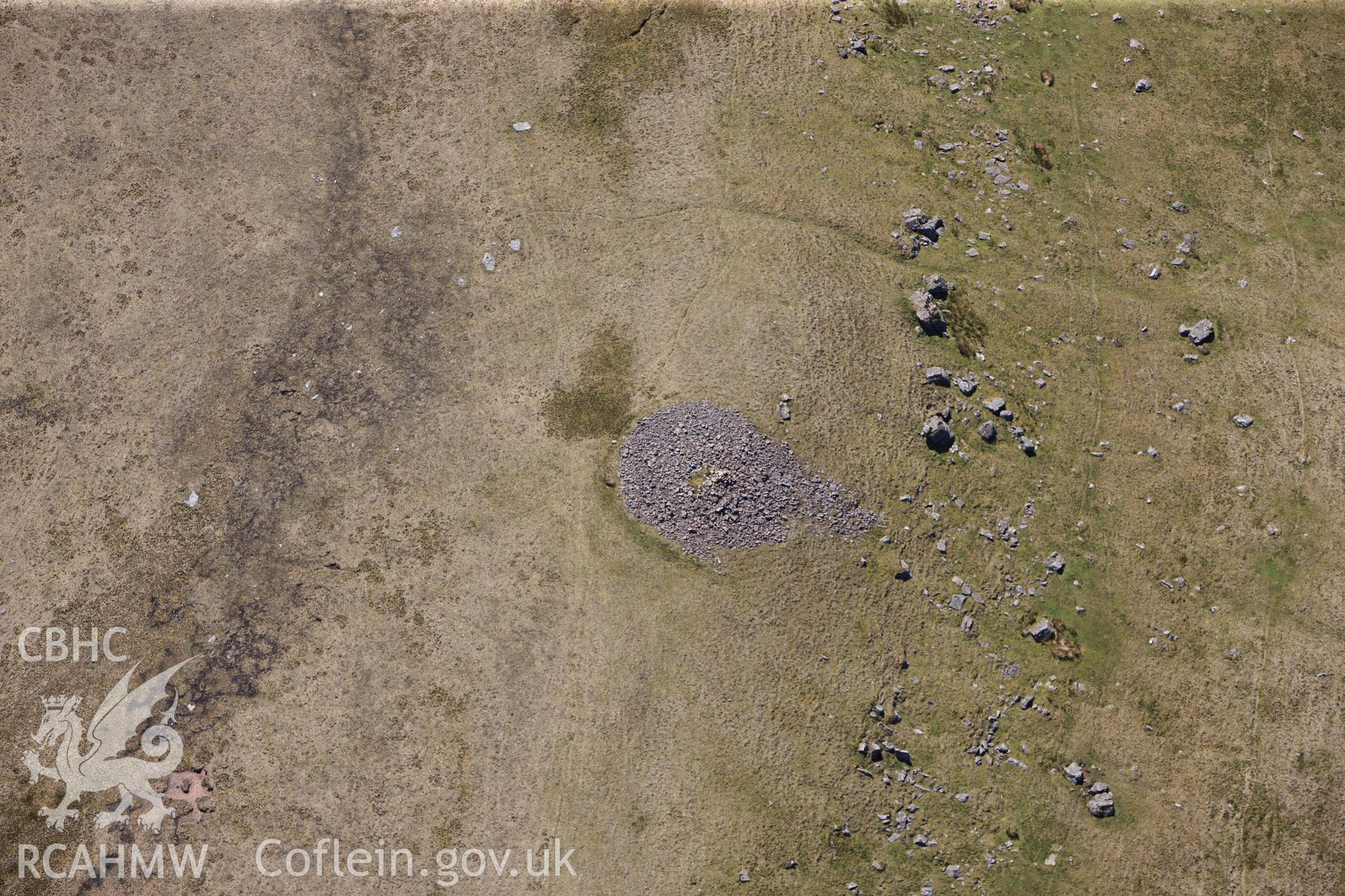 RCAHMW colour oblique photograph of Carn y Gigfran, cairn, detail. Taken by Toby Driver on 22/05/2012.