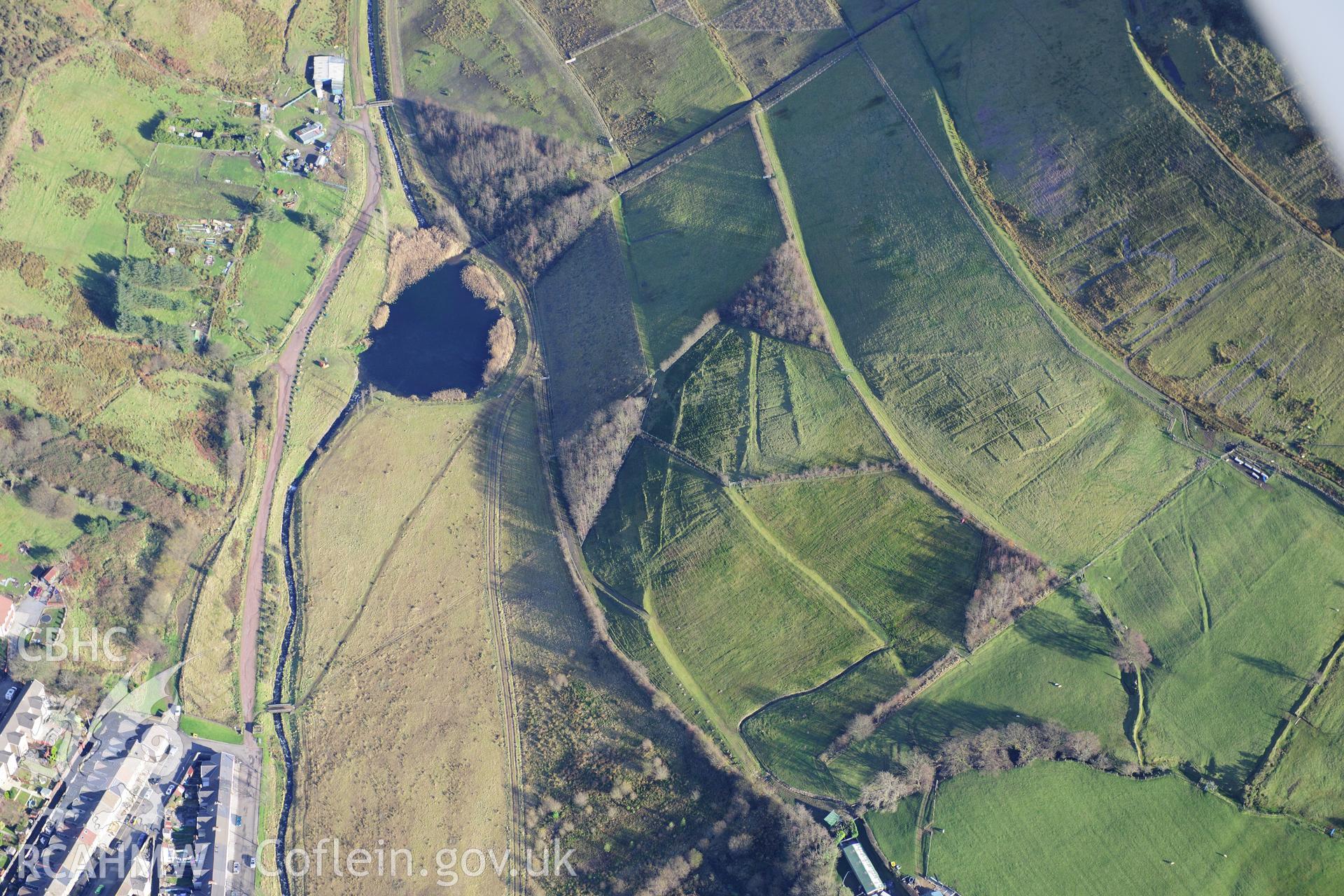 RCAHMW colour oblique photograph of Blaengarw colliery, site, with landscaped tips. Taken by Toby Driver on 28/11/2012.