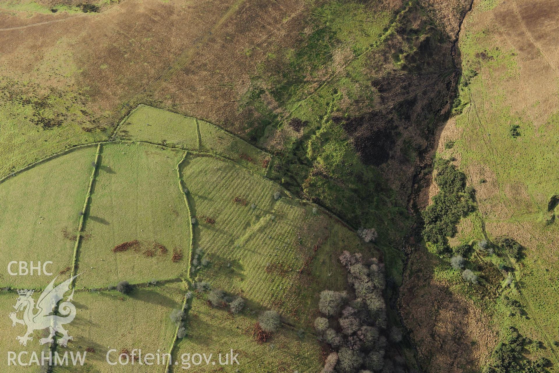 RCAHMW colour oblique photograph of Plas-y-coed coal mine, historic workings. Taken by Toby Driver on 28/11/2012.