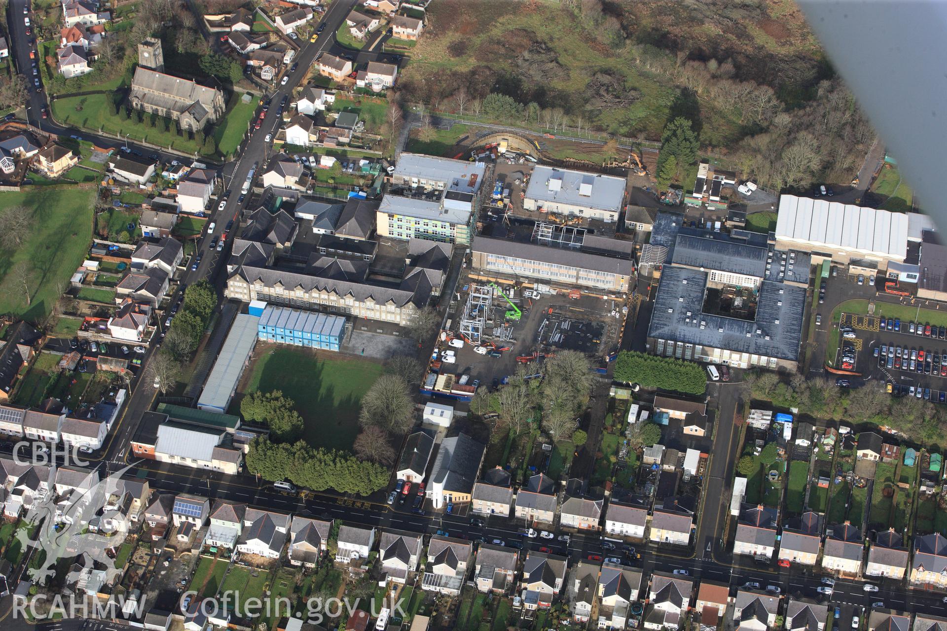 RCAHMW colour oblique photograph of Amman Valley Intermediate School, Ammanford. Taken by Toby Driver on 27/01/2012.