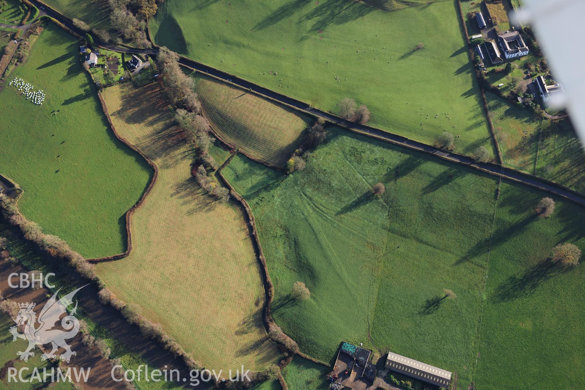 RCAHMW colour oblique photograph of Manorafan, earthworks of early field system in parkland. Taken by Toby Driver on 23/11/2012.