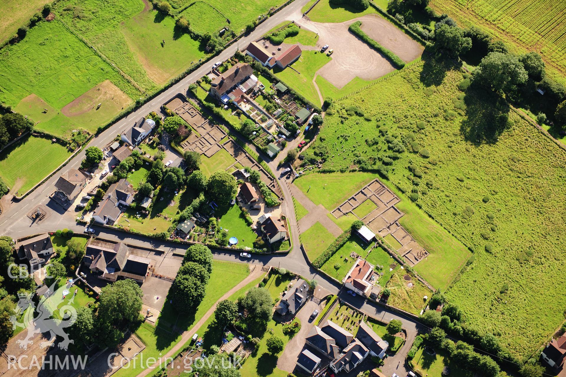 RCAHMW colour oblique photograph of Caerwent Roman town, Pound Lane shops and town house. Taken by Toby Driver on 24/07/2012.
