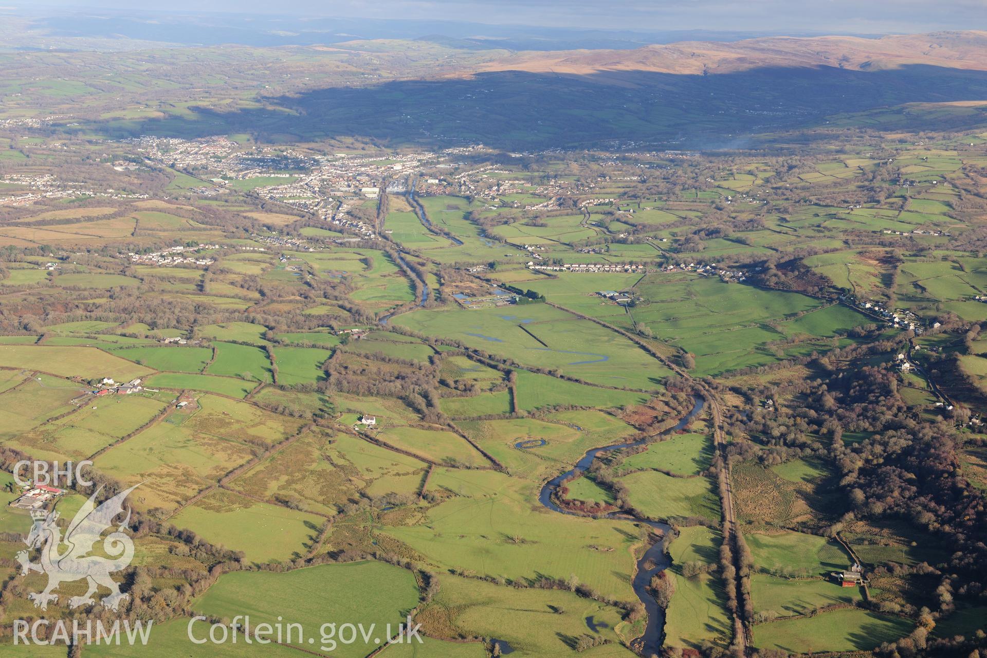 RCAHMW colour oblique photograph of Ynys y Capel, landscape view from south-west along Loughor valley. Taken by Toby Driver on 28/11/2012.