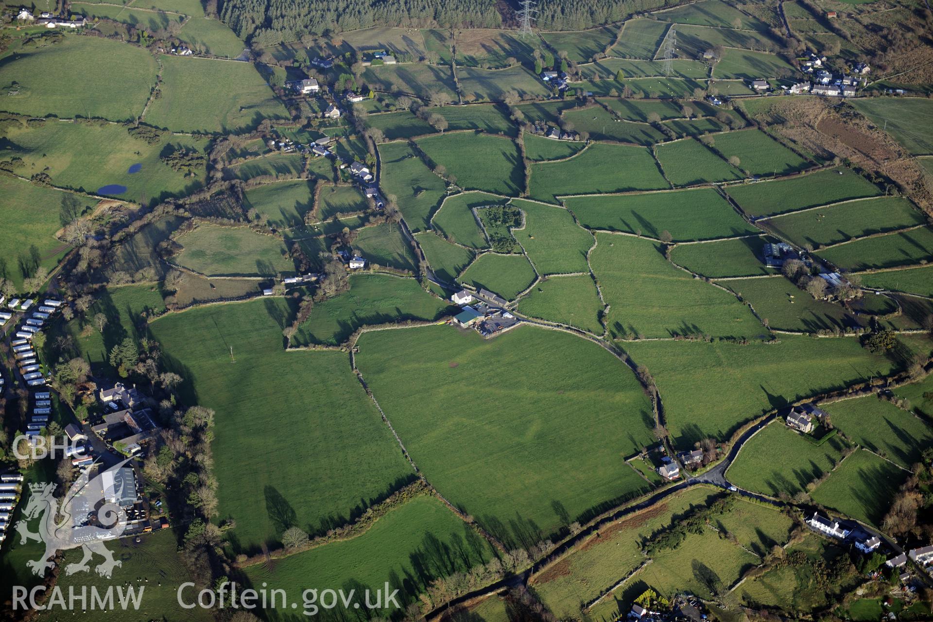 RCAHMW colour oblique photograph of Pen y Gaer settlements and field systems, Glascoed. Taken by Toby Driver on 10/12/2012.