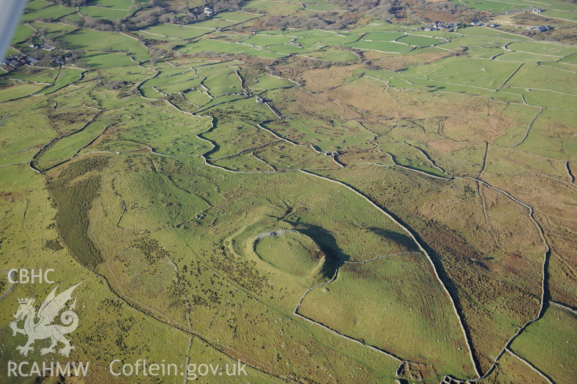 RCAHMW colour oblique photograph of Pen y Dinas, hillfort and upland landscape. Taken by Toby Driver on 10/12/2012.