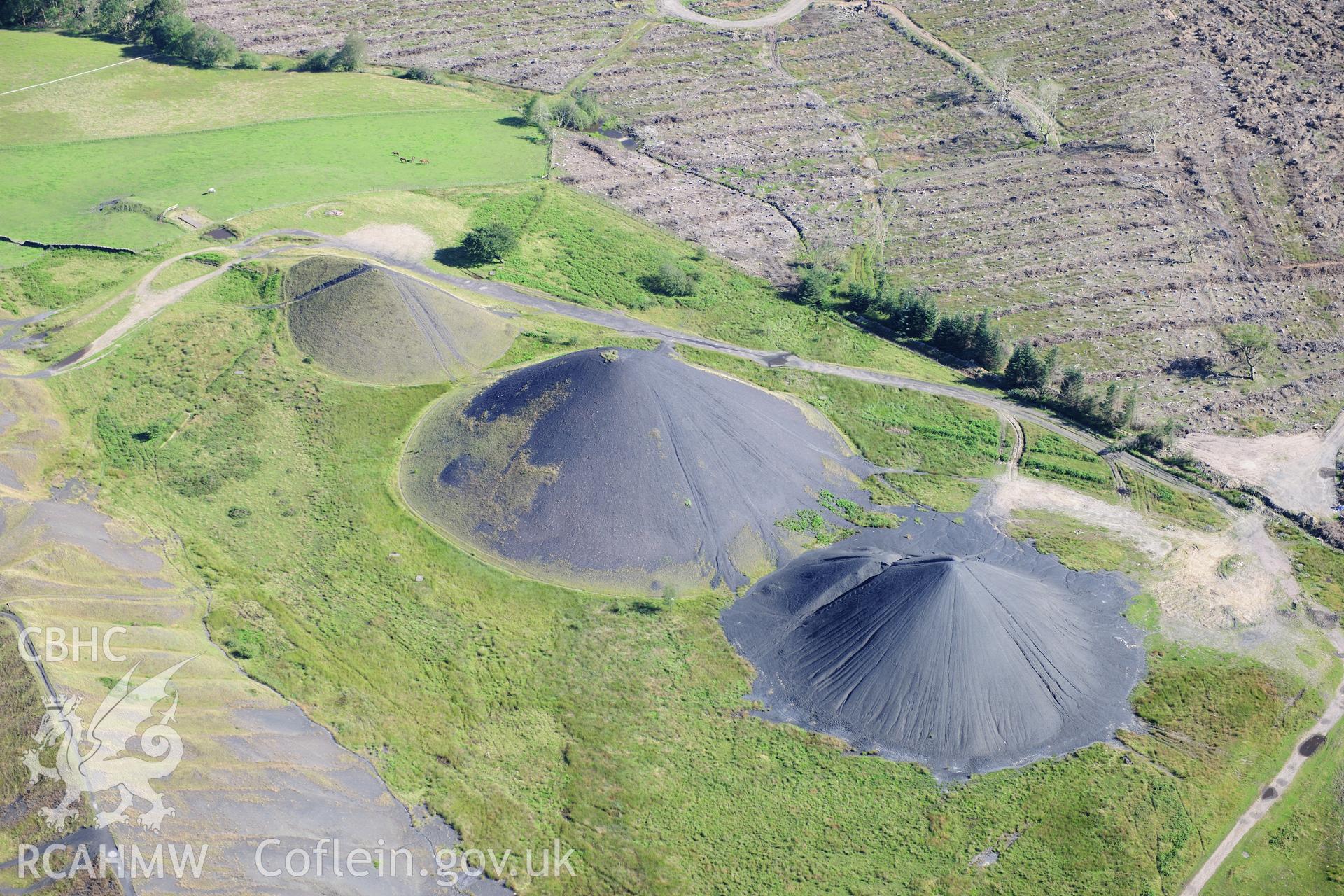 RCAHMW colour oblique photograph of Llanbradach Colliery spoil tips. Taken by Toby Driver on 24/07/2012.