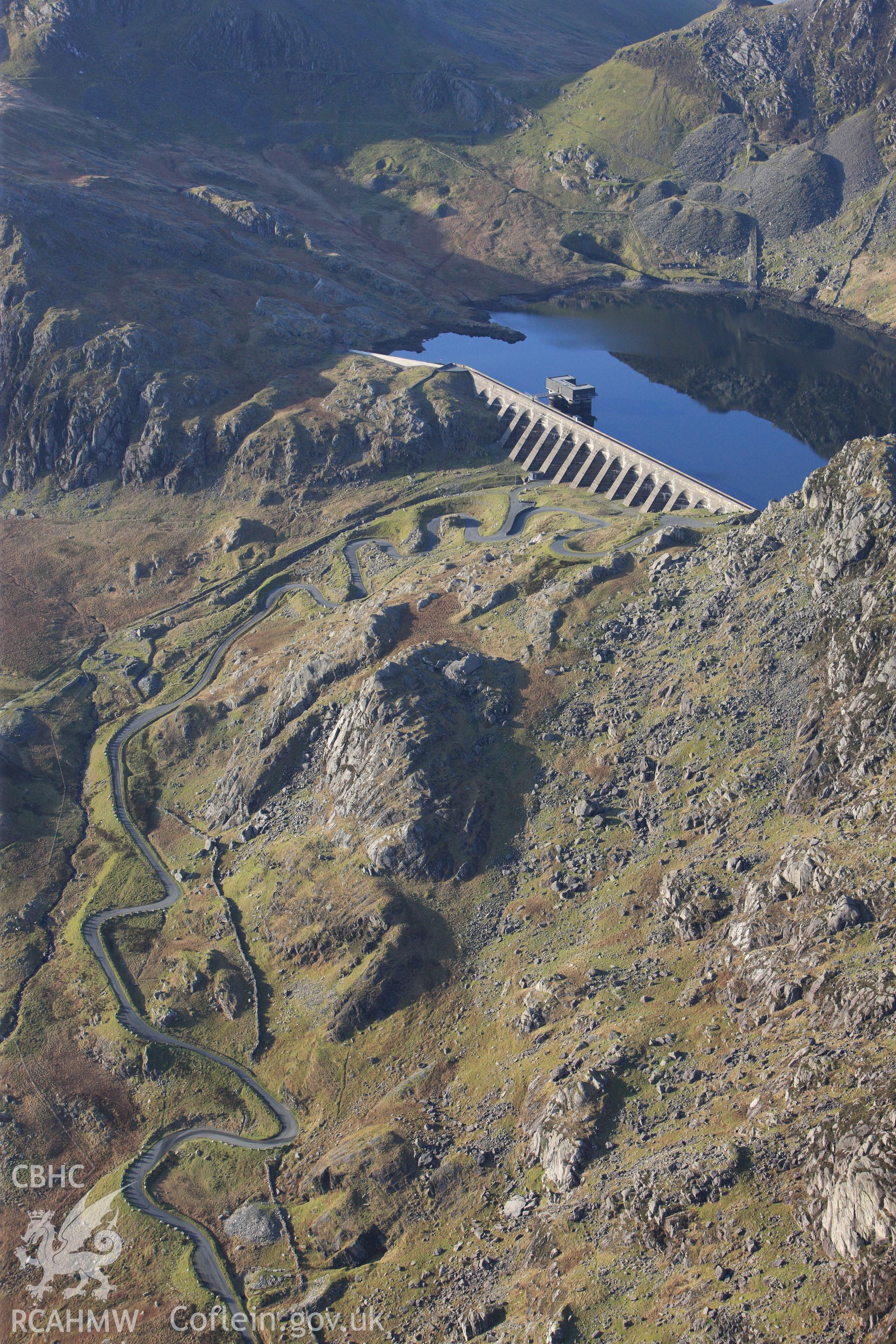 RCAHMW colour oblique photograph of Llyn Stwlan reservoir, with Moelwyn slate quarry. Taken by Toby Driver on 13/01/2012.