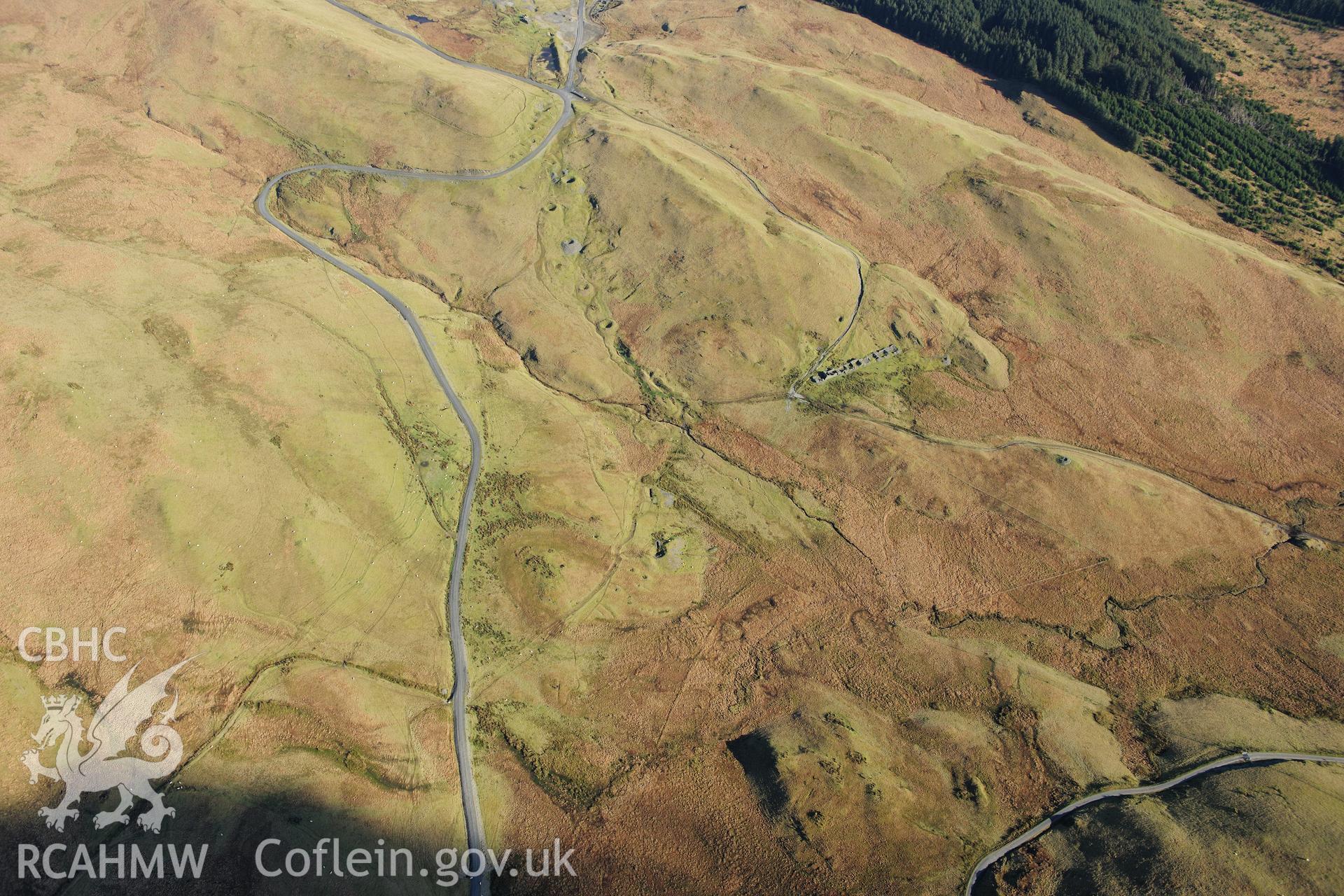 RCAHMW colour oblique photograph of Esgair Hir Lead Mine, barracks, landscape view. Taken by Toby Driver on 05/11/2012.