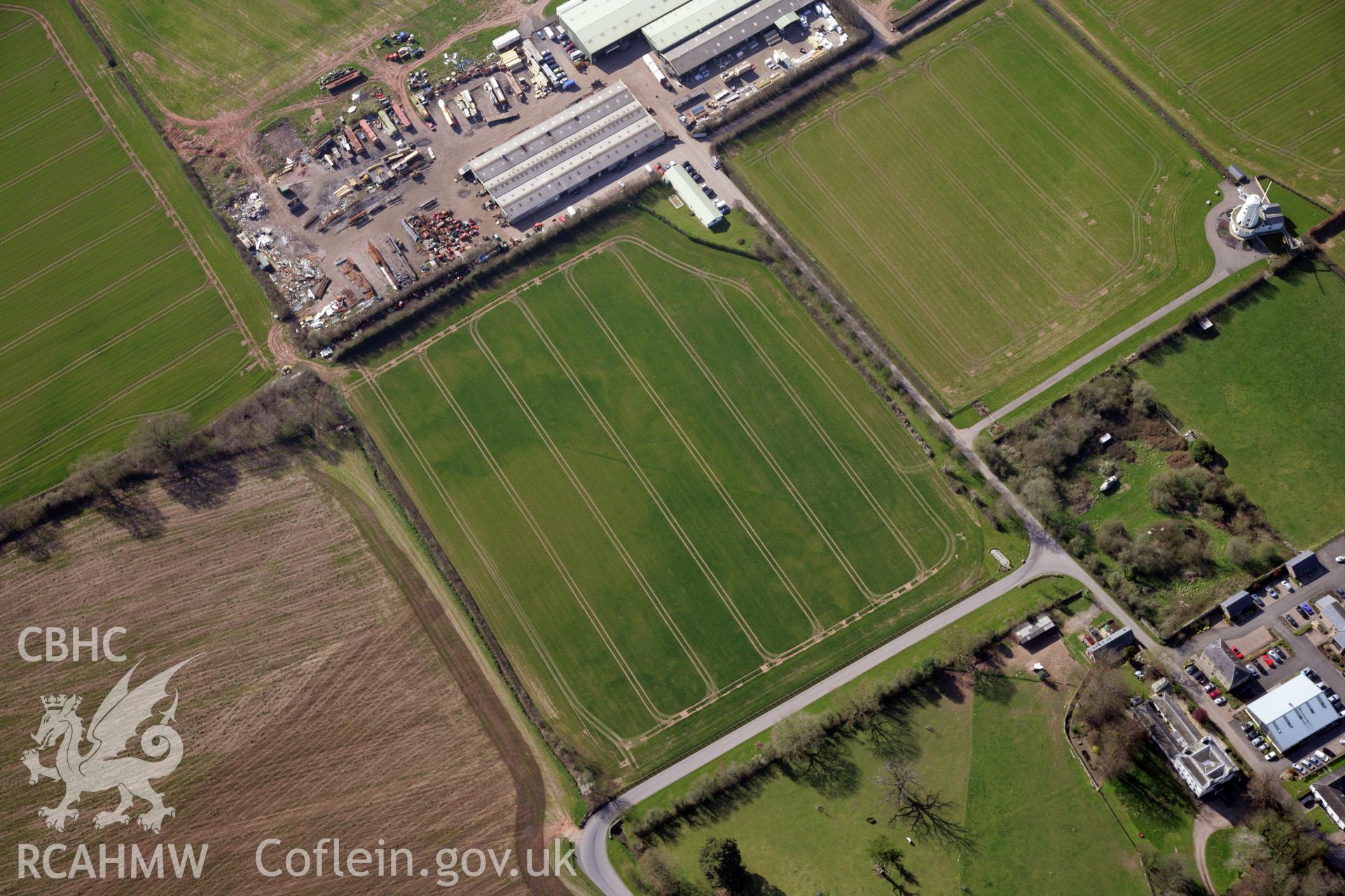 RCAHMW colour oblique photograph of Llancayo Farm barrow cemetery, southern cluster. Taken by Toby Driver and Oliver Davies on 28/03/2012.