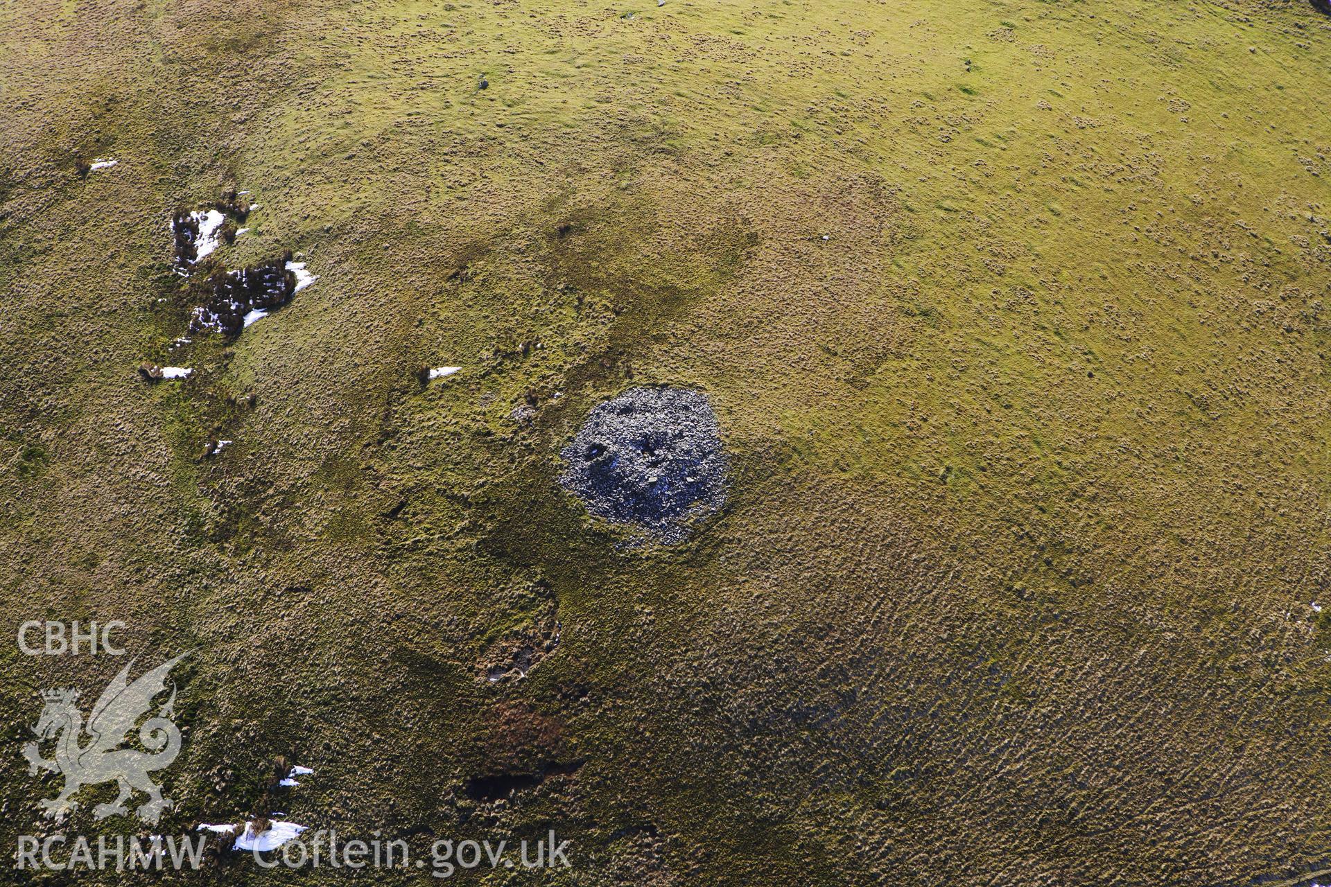 RCAHMW colour oblique photograph of Y Garn, Cairn. Taken by Toby Driver on 07/02/2012.