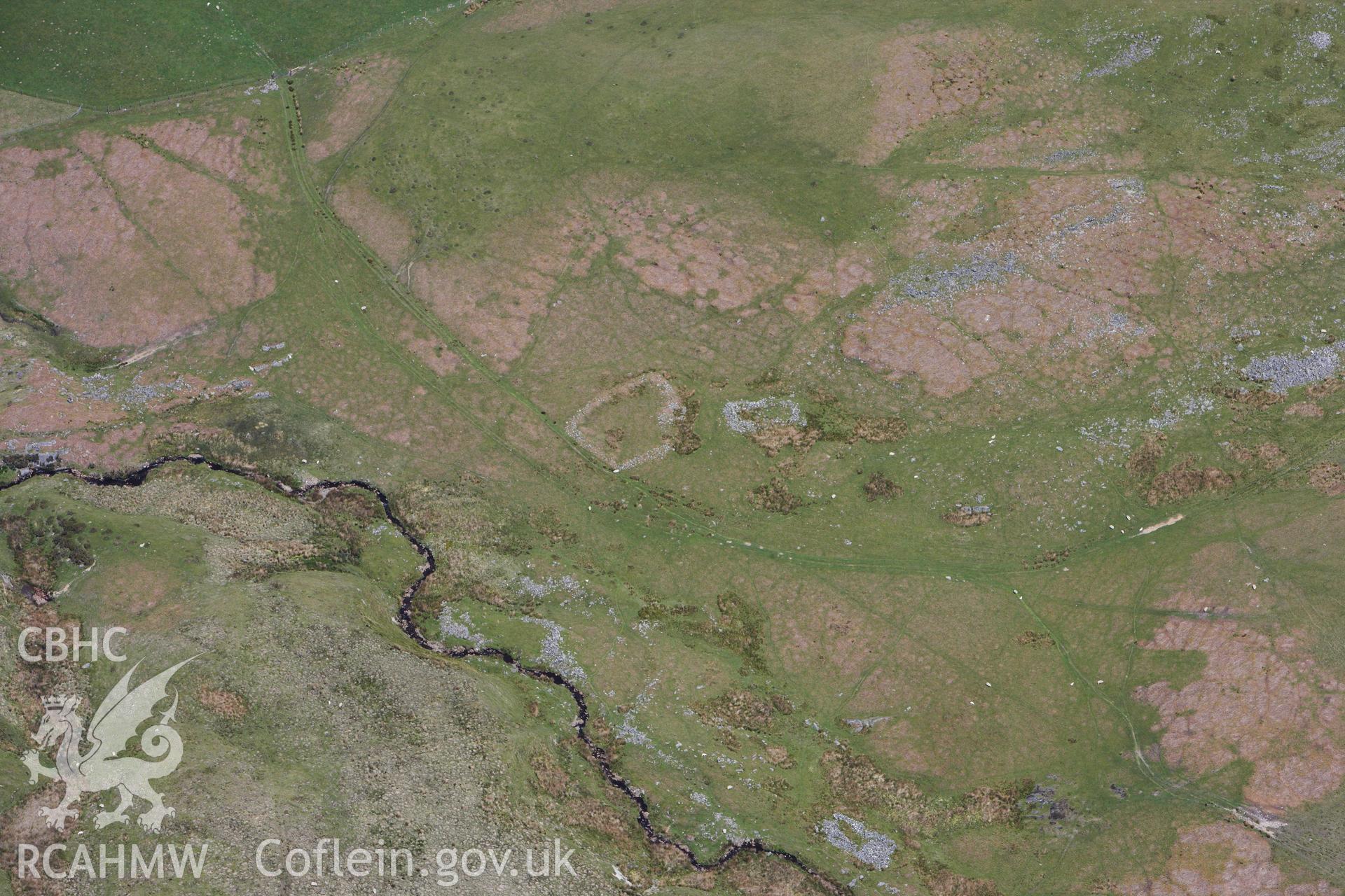 RCAHMW colour oblique photograph of Hafotau Settlement on Esgair Gwar-Y-Cae. Taken by Toby Driver on 28/05/2012.