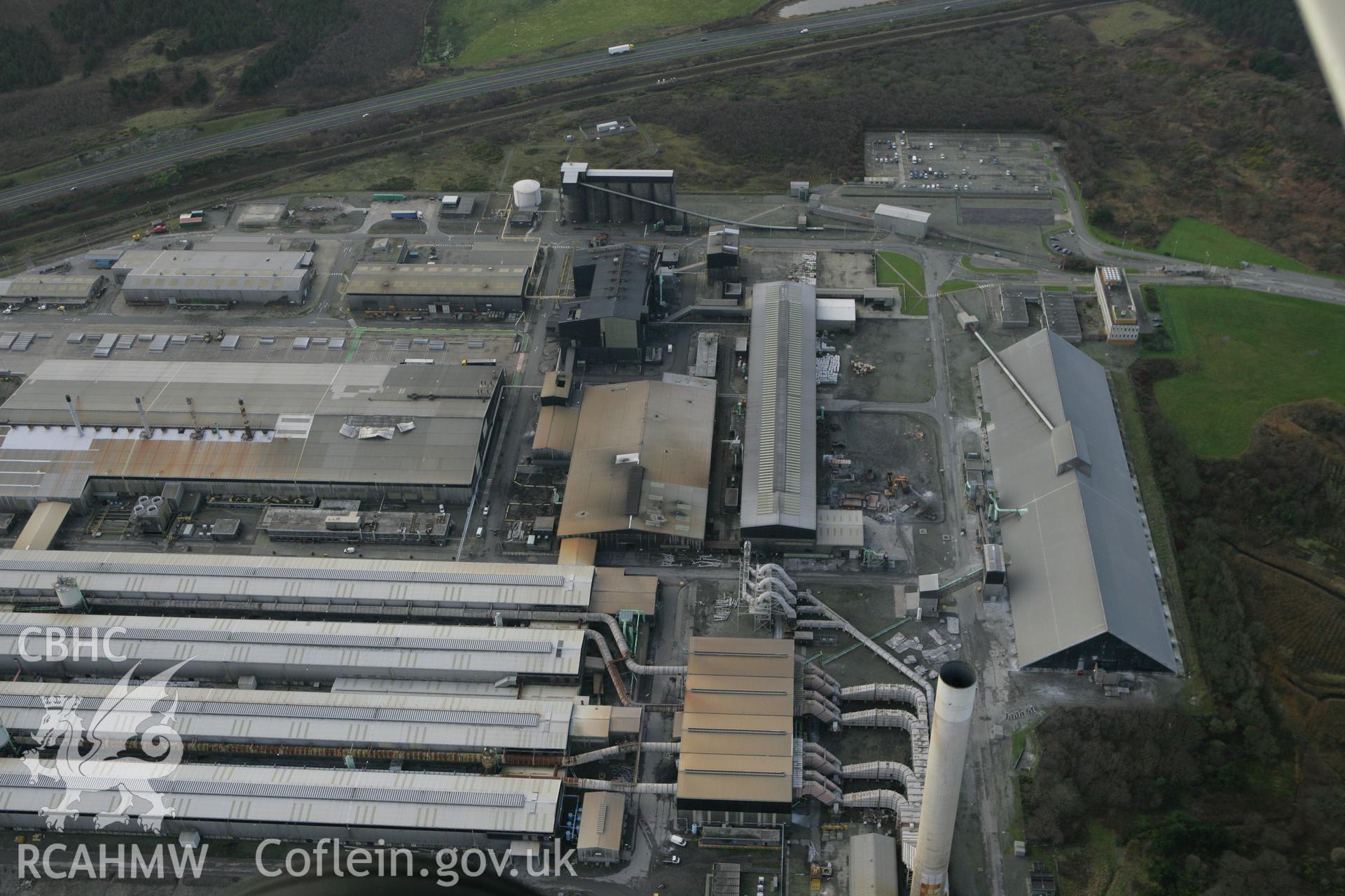 RCAHMW colour oblique photograph of Anglesey Aluminium Smelting Works, aerial survey prior to closure. Taken by Toby Driver on 13/01/2012.