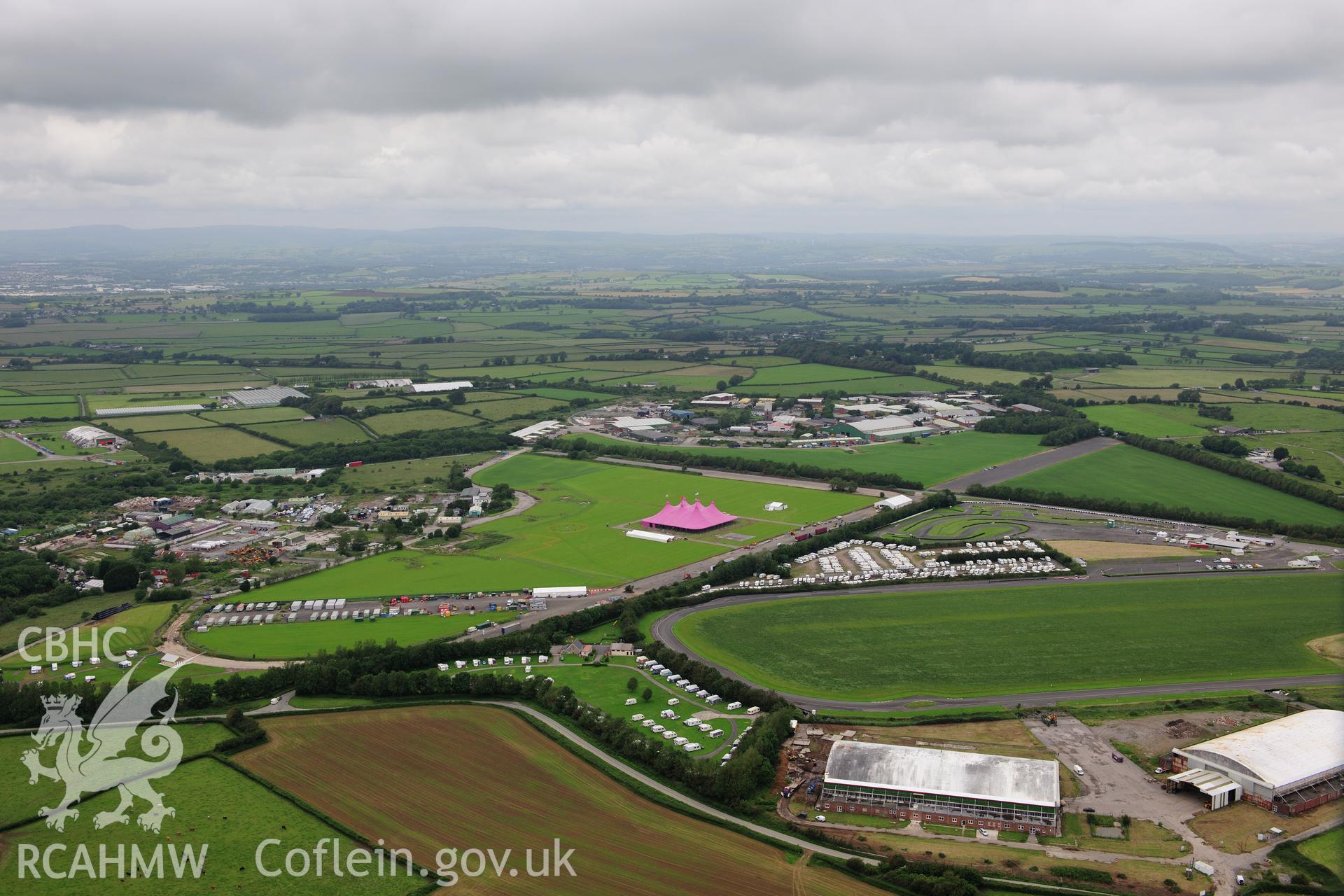 RCAHMW colour oblique photograph of Llandow Airfield 2012 National Eisteddfod. Taken by Toby Driver on 05/07/2012.