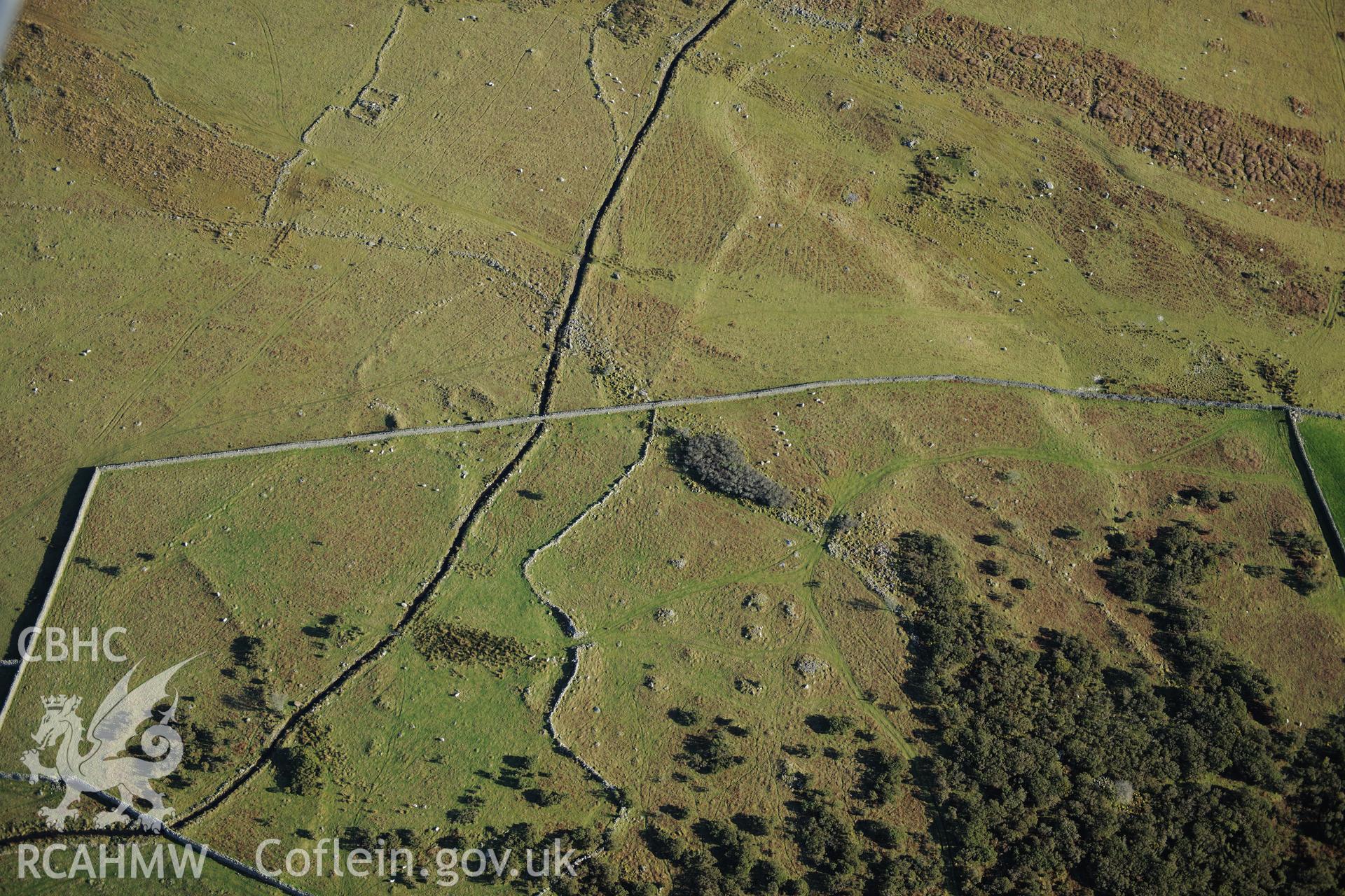 RCAHMW colour oblique photograph of Pont Fadog, hut circle settlement. Taken by Toby Driver on 10/12/2012.