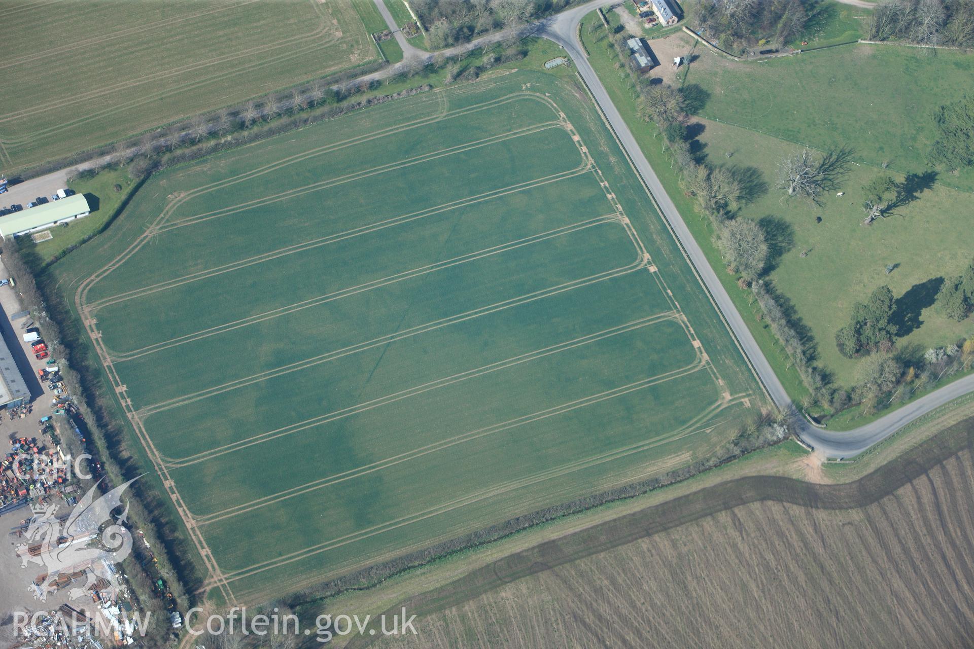 RCAHMW colour oblique photograph of Llancayo Farm barrow cemetery, southern cluster. Taken by Toby Driver and Oliver Davies on 28/03/2012.