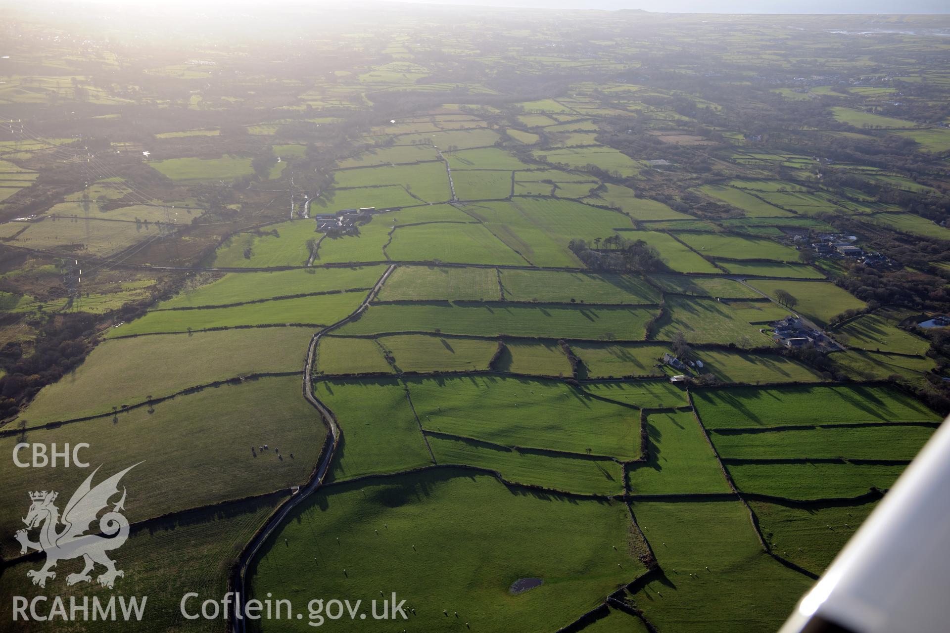 RCAHMW colour oblique photograph of Tyddyn Whisgin Bach early field system. Taken by Toby Driver on 10/12/2012.