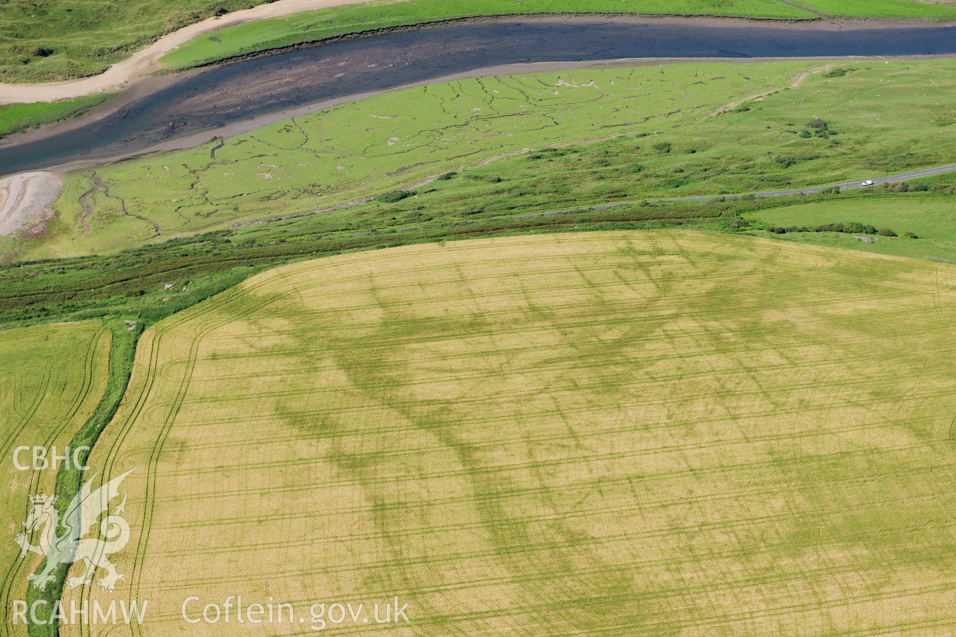 RCAHMW colour oblique photograph of Norton west, promontory enclosure. Taken by Toby Driver on 24/07/2012.