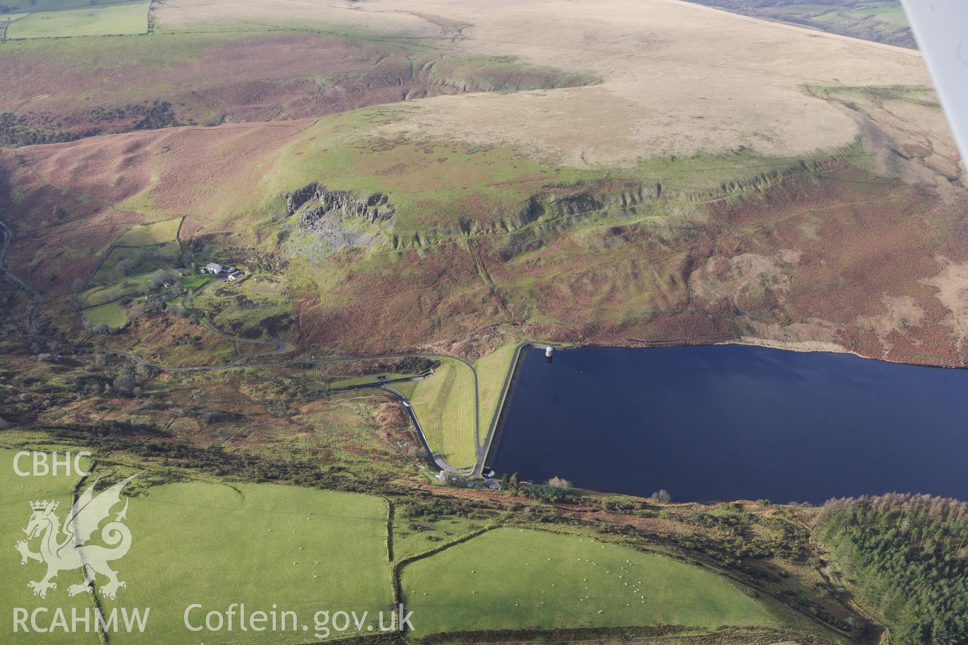 RCAHMW colour oblique photograph of Upper Lliw reservoir, with the valve house. Taken by Toby Driver on 27/01/2012.