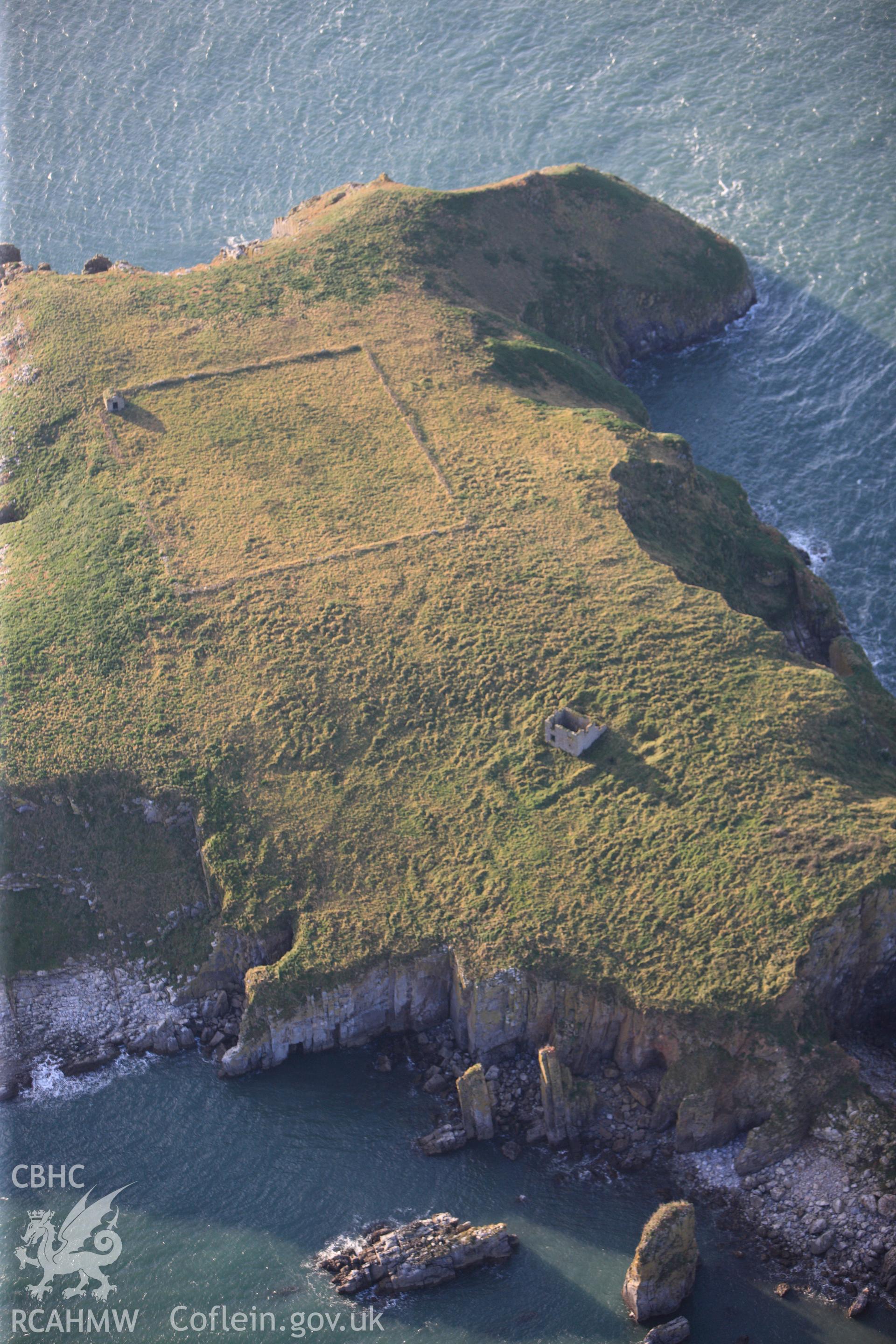 RCAHMW colour oblique photograph of Detail view of chapel ruins and field enclosure, St Margaret's Island. Taken by Toby Driver on 26/10/2012.