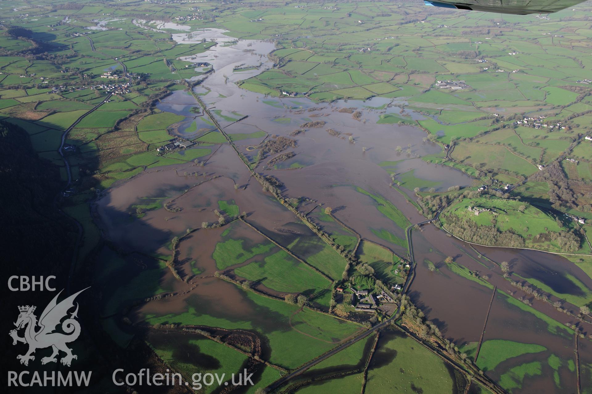 RCAHMW colour oblique photograph of Dryslwyn Castle, with flooding on the River Tywi, panoramic view from south-east. Taken by Toby Driver on 23/11/2012.