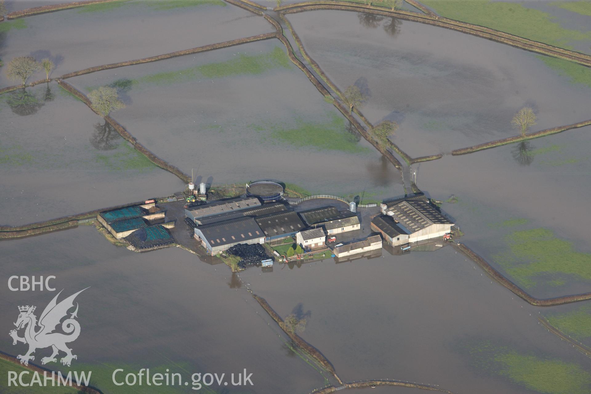 RCAHMW colour oblique photograph of Glantowy Fawr farm, with flooding, view from south. Taken by Toby Driver on 23/11/2012.