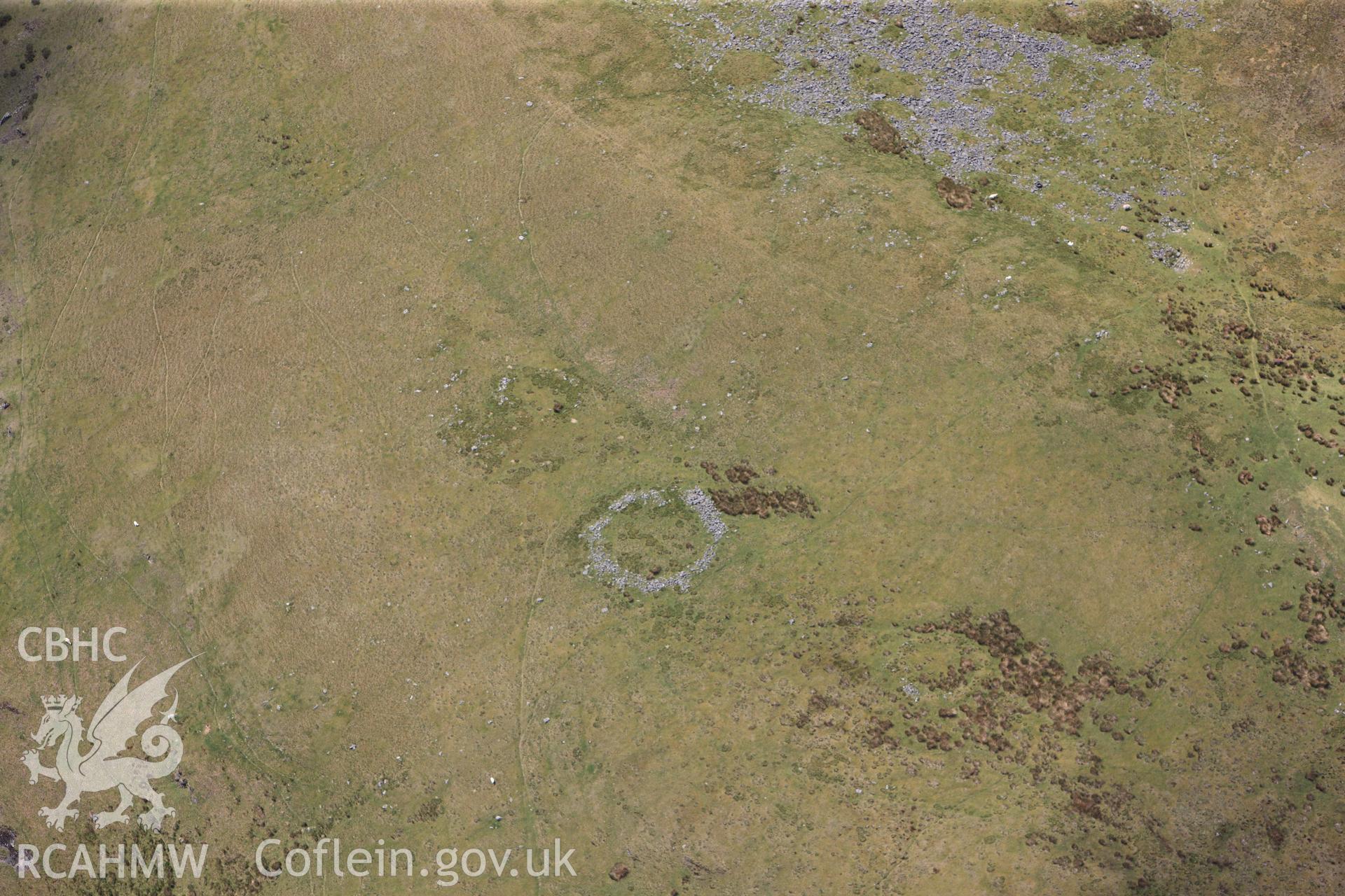 RCAHMW colour oblique photograph of Prehistoric Enclosure settlement site on Craig y Llysiau. Taken by Toby Driver on 28/05/2012.