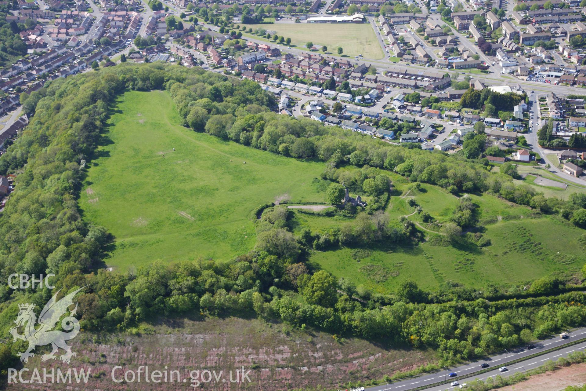 RCAHMW colour oblique photograph of Caerau hillfort viewed from the south-east, with Time Team trenches visible. Taken by Toby Driver on 22/05/2012.