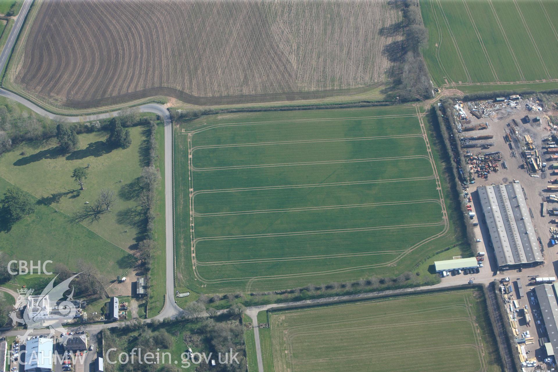 RCAHMW colour oblique photograph of Llancayo Farm barrow cemetery, southern cluster. Taken by Toby Driver and Oliver Davies on 28/03/2012.