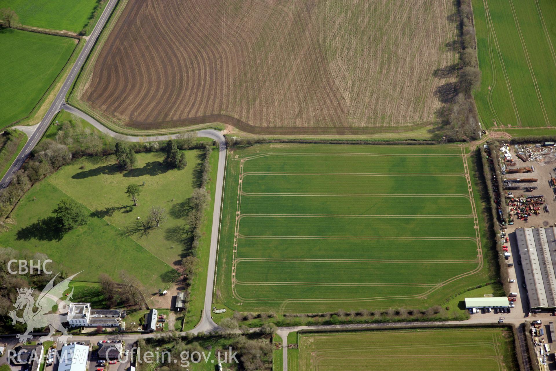 RCAHMW colour oblique photograph of Llancayo Farm barrow cemetery, southern cluster. Taken by Toby Driver and Oliver Davies on 28/03/2012.